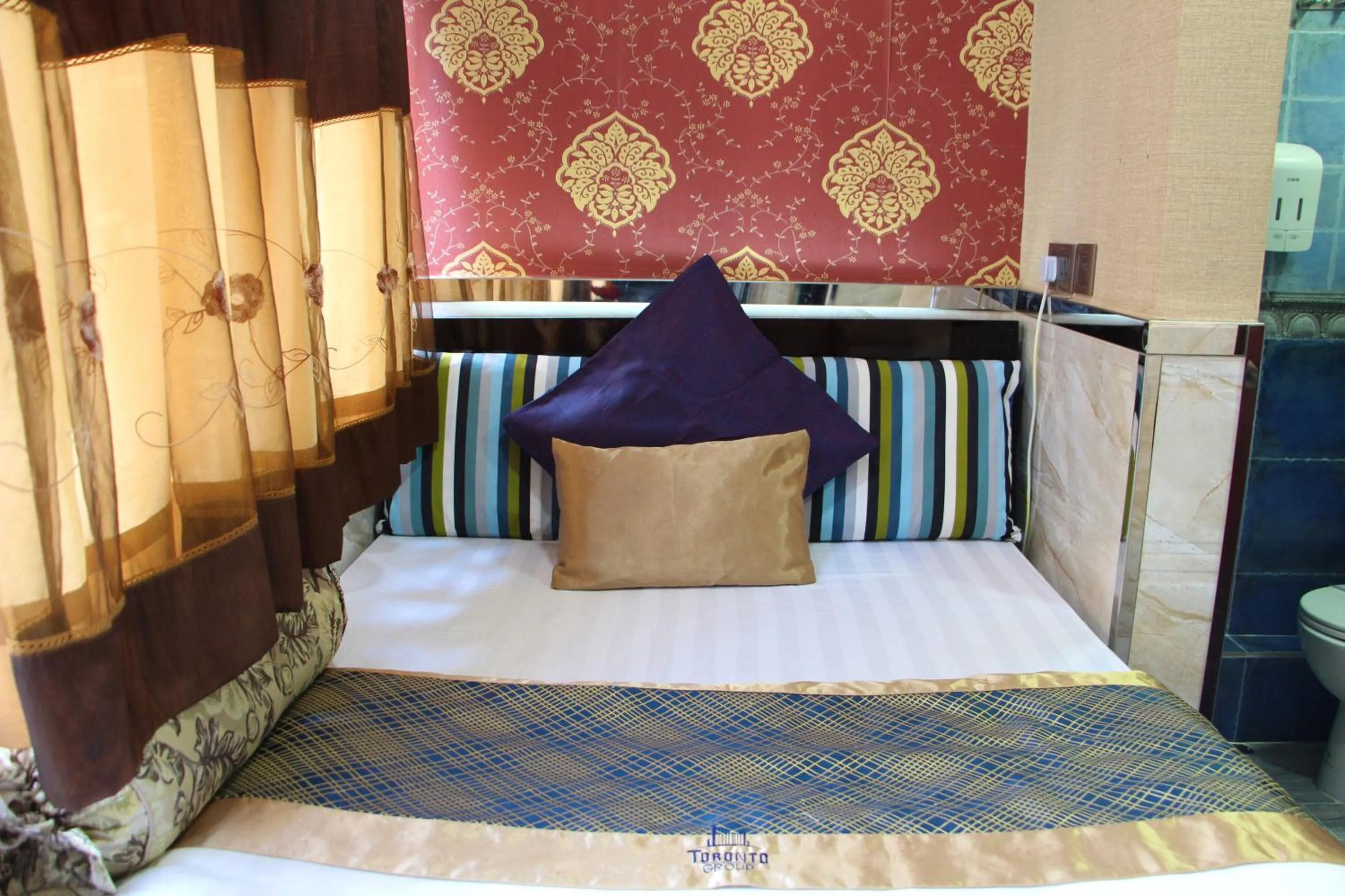 Bed in Temple Street Hotel