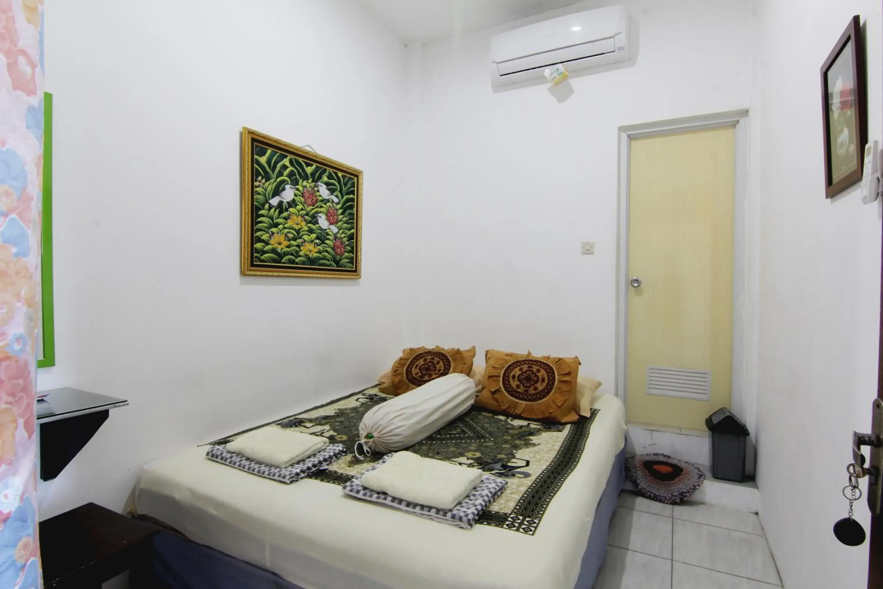 Photo of the whole room, Bed in Tiga Dua Homestay