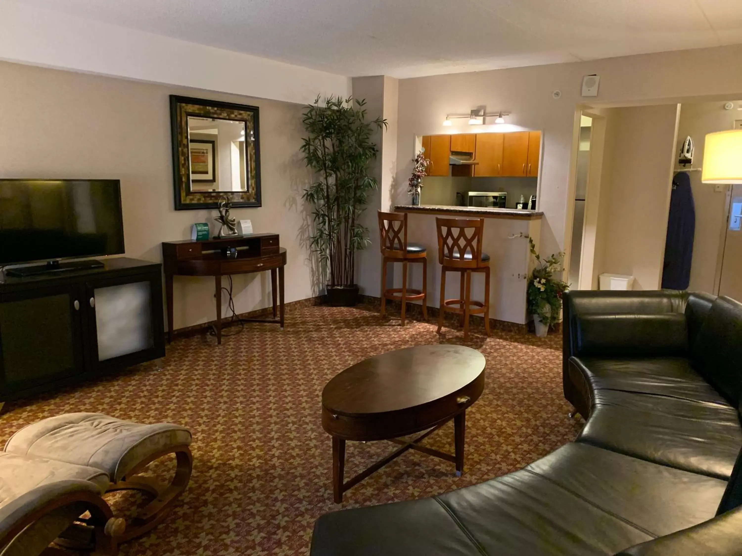 Bedroom, Seating Area in Holiday Inn Johnstown-Downtown, an IHG Hotel