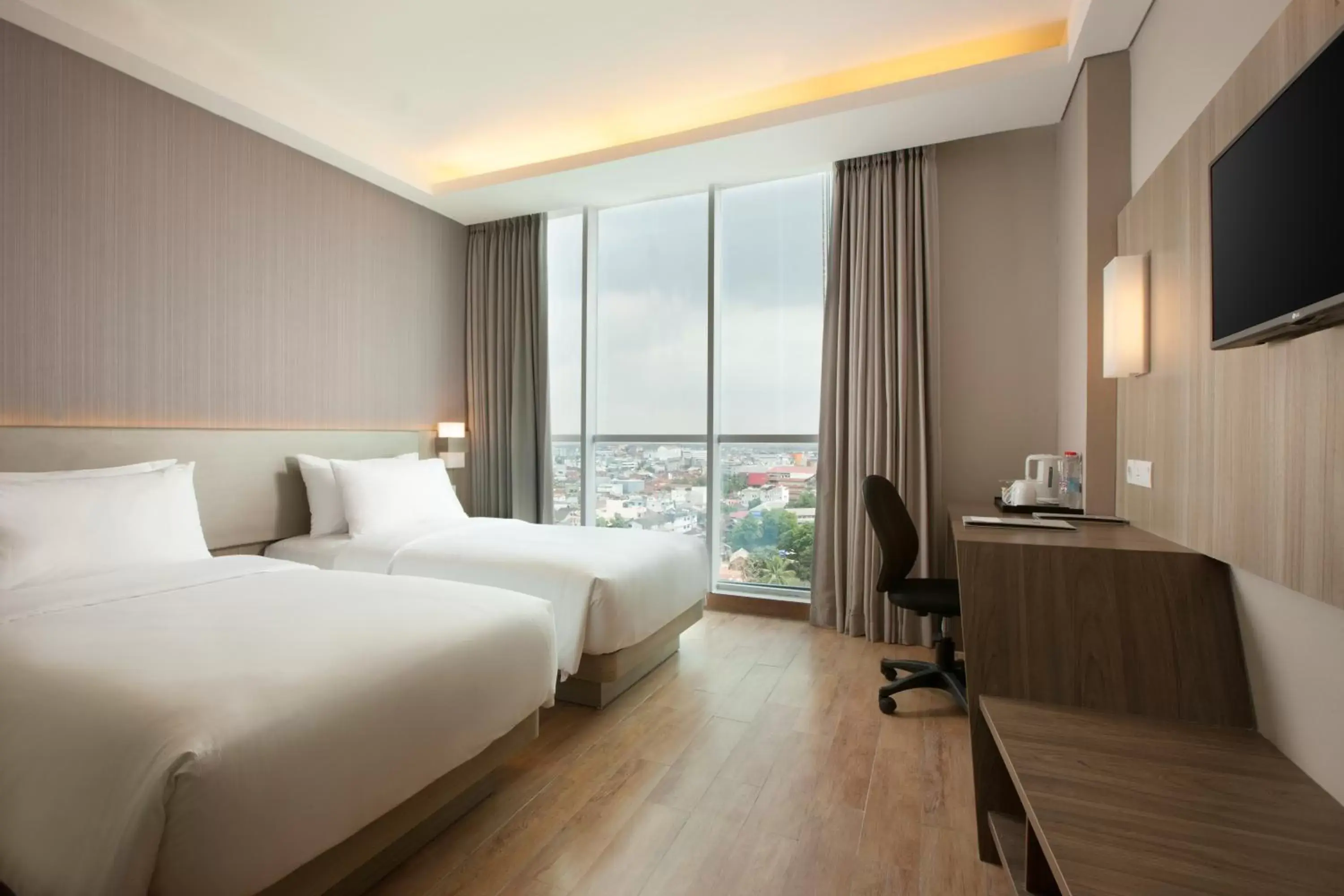 Photo of the whole room in Hotel Santika Radial Palembang