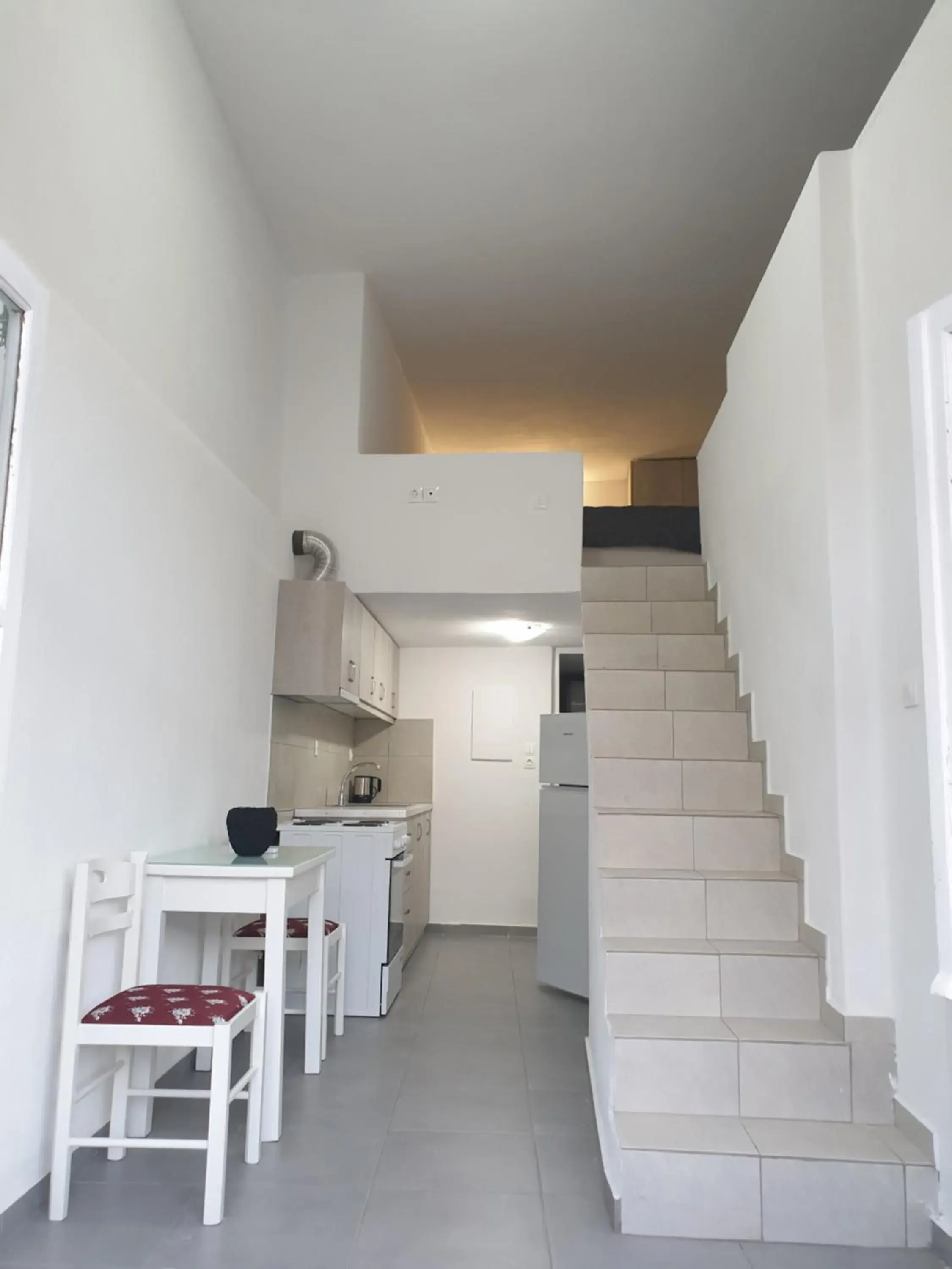 Seating area, Kitchen/Kitchenette in Porto Castello