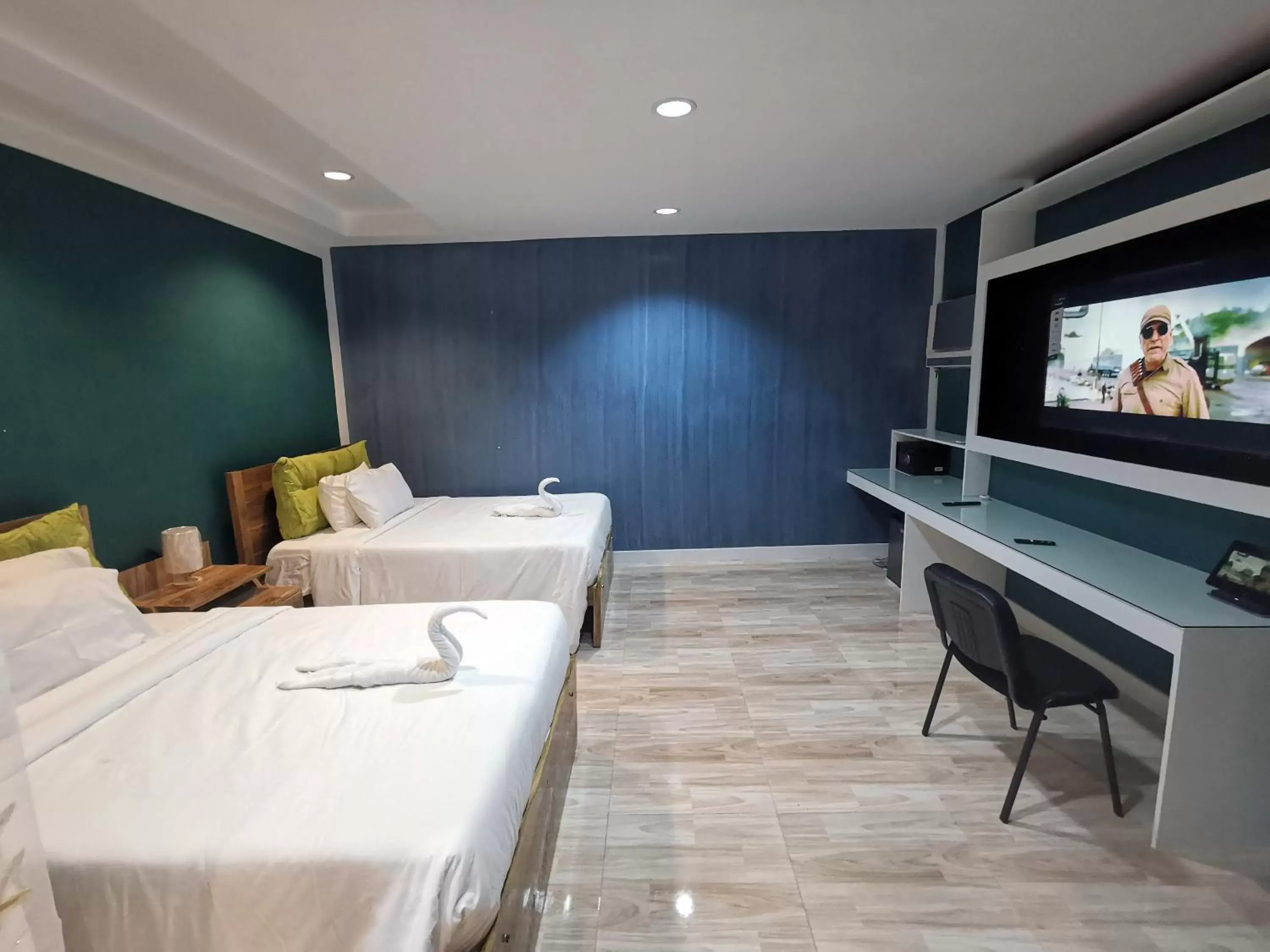 Bedroom, TV/Entertainment Center in Pescadores Suites Moalboal
