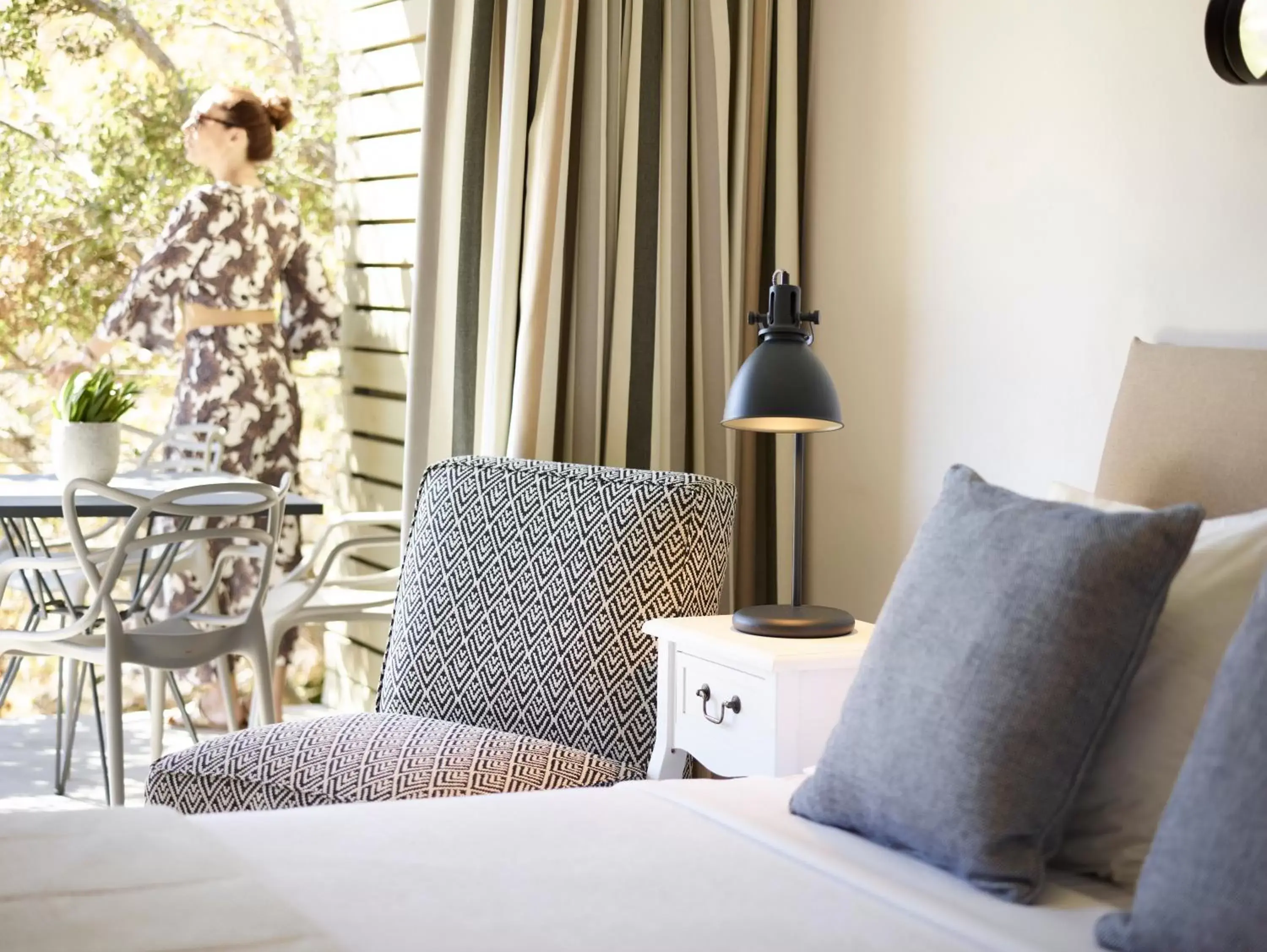 Bed, Seating Area in Aeolis Tinos Suites