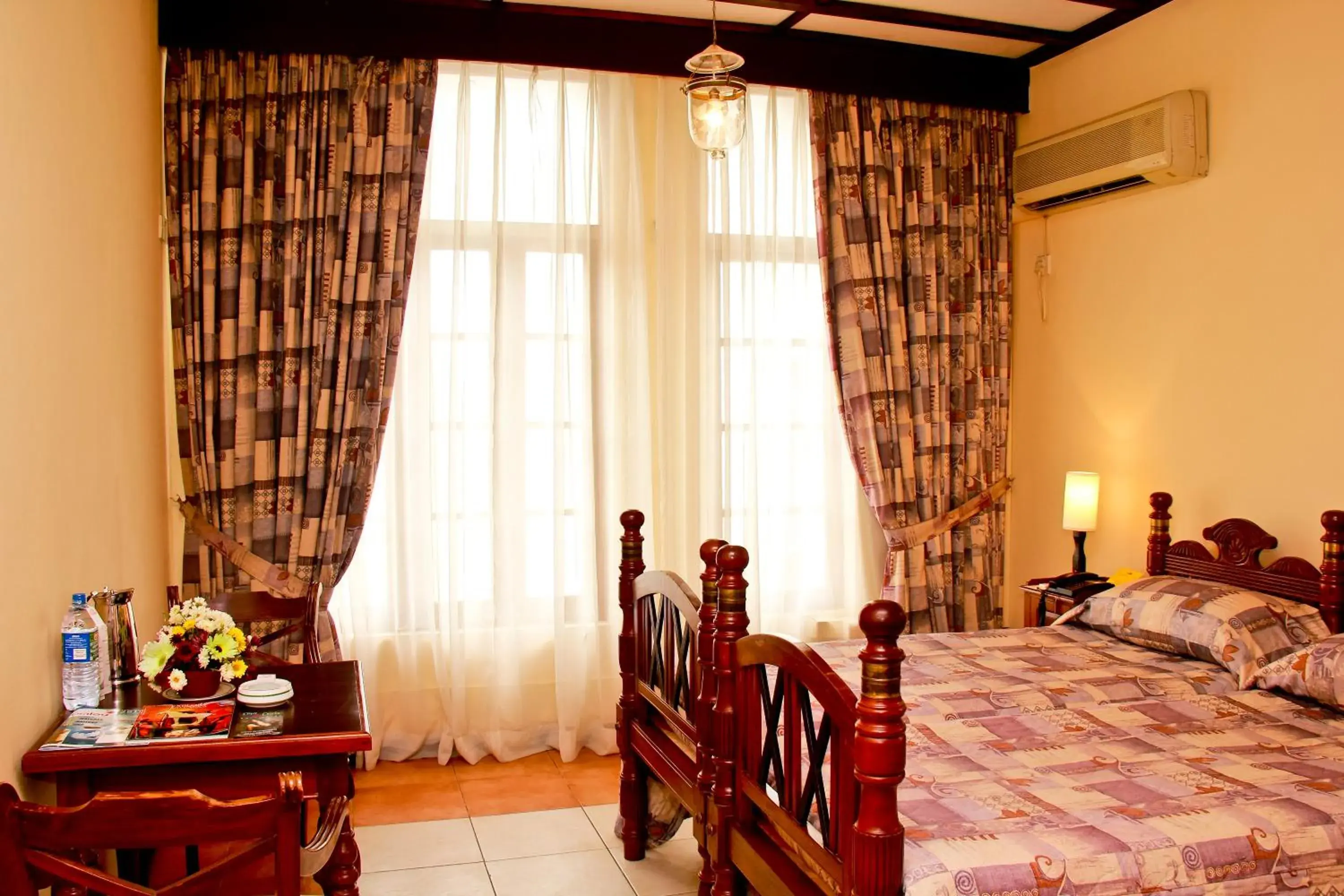 Bedroom, Dining Area in Grand Oriental Hotel