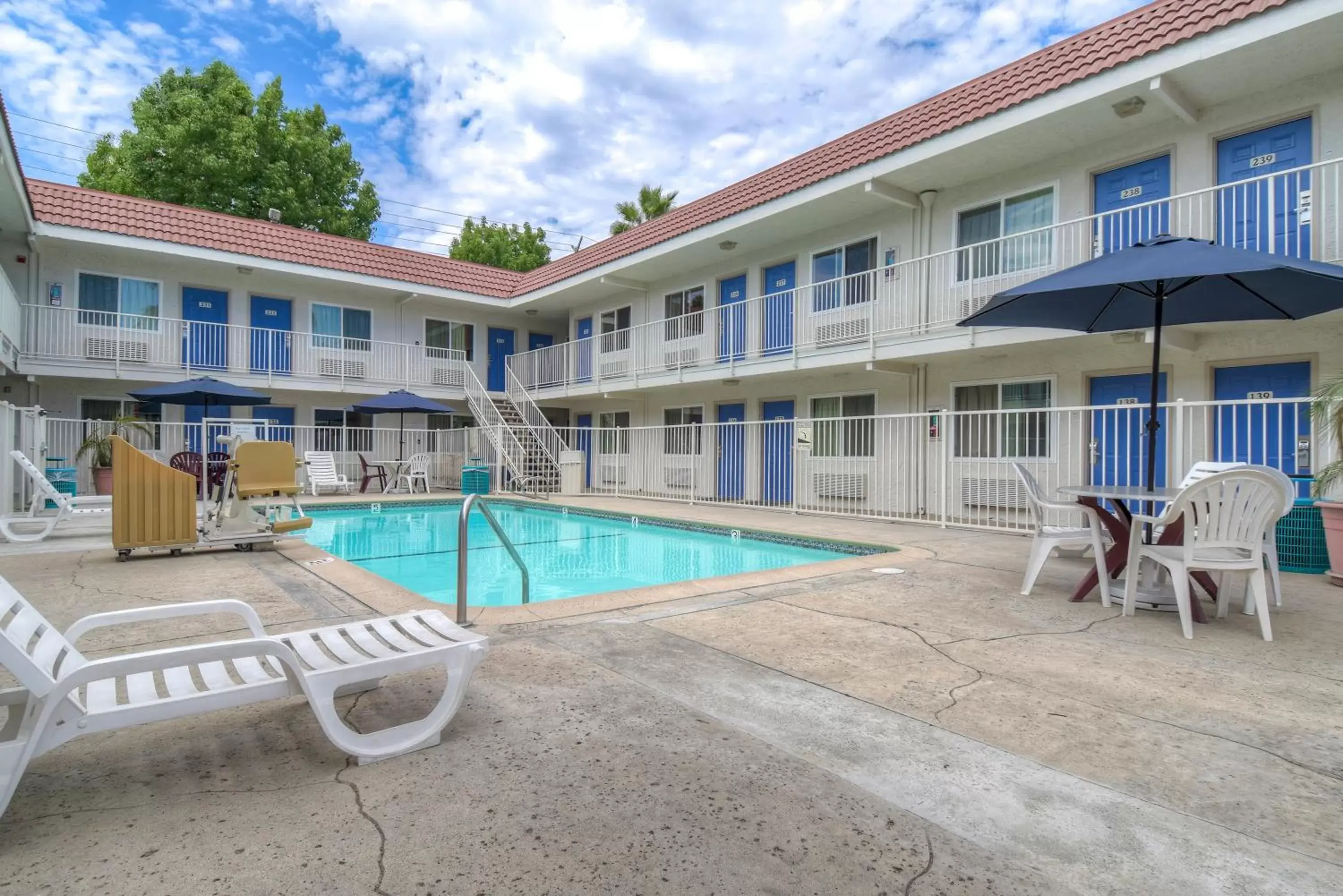 Swimming pool, Property Building in Motel 6-Costa Mesa, CA