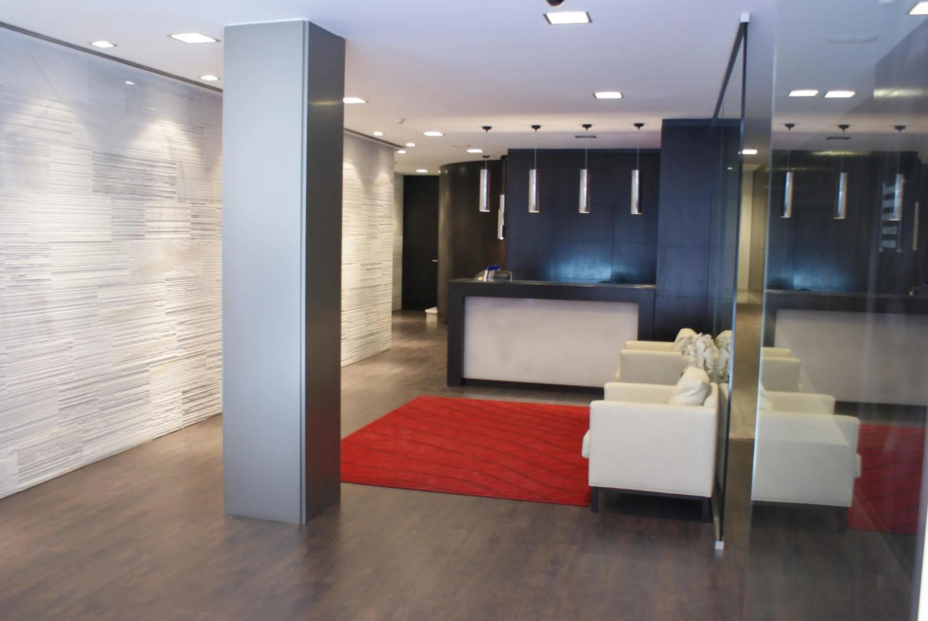 Lobby or reception in Hotel Universal by Maxi Hoteles