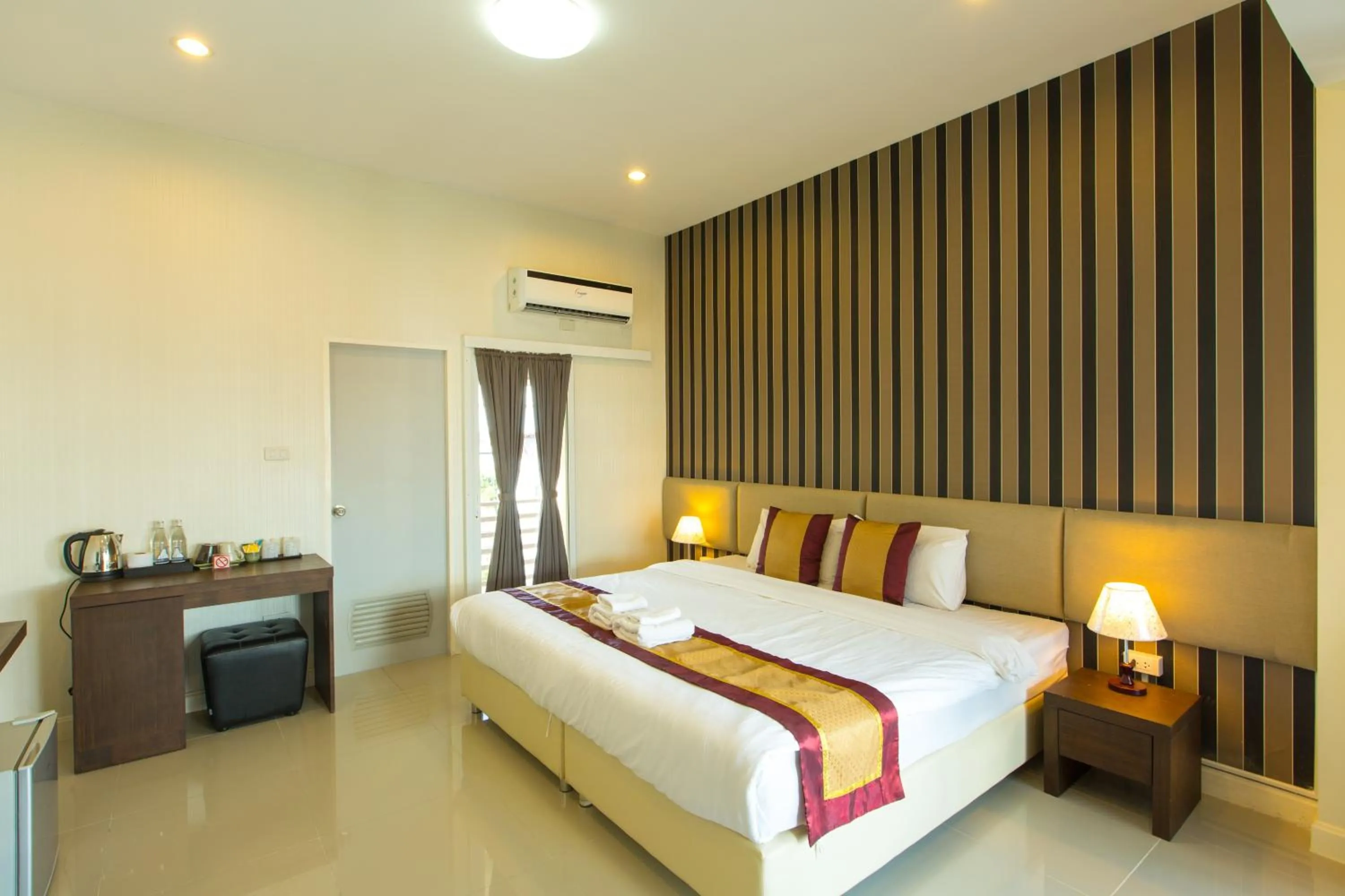 Decorative detail, Bed in Chiang Mai Waroros Boutique Hotel