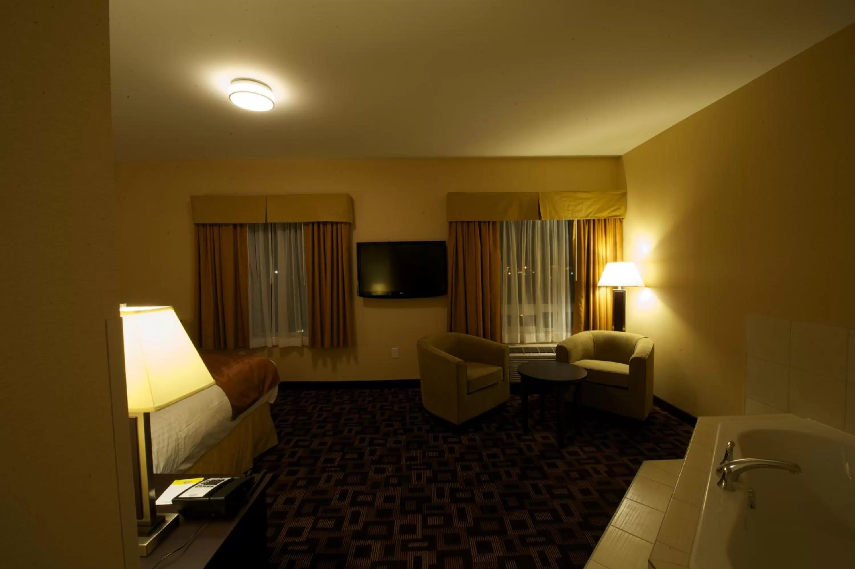 Seating area in Days Inn & Suites by Wyndham Winnipeg Airport Manitoba