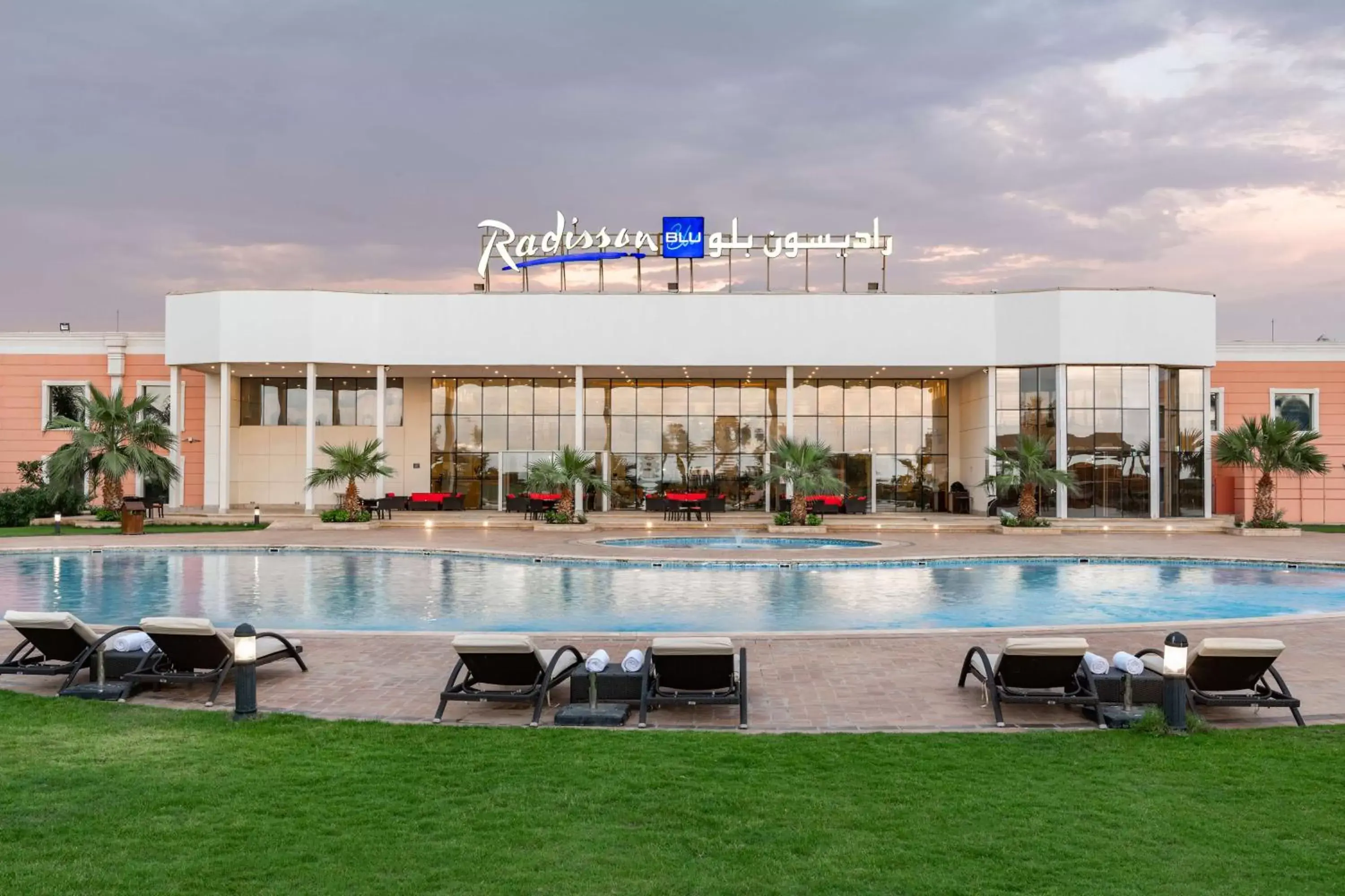 Swimming pool, Property Building in Radisson Blu Resort Jizan