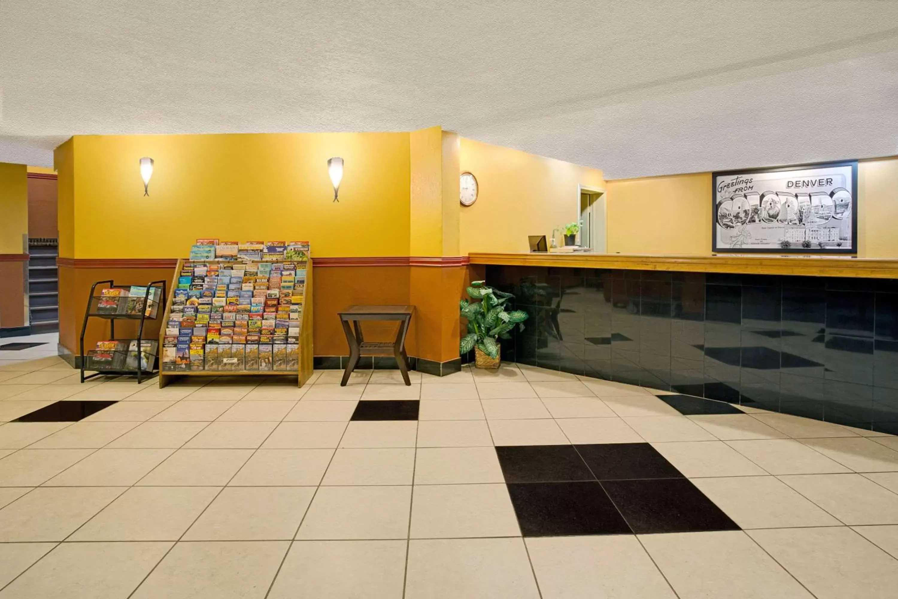 Lobby or reception in Super 8 by Wyndham Denver Stapleton Lobby or reception in Super 8 by Wyndham Denver Stapleton