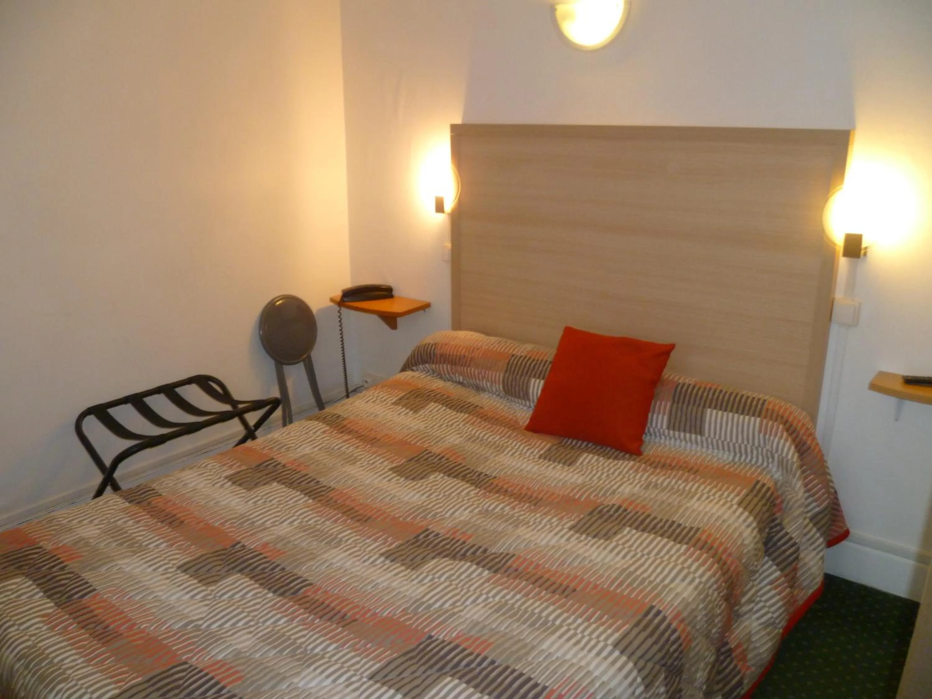 Bed in Hôtel Beauséjour