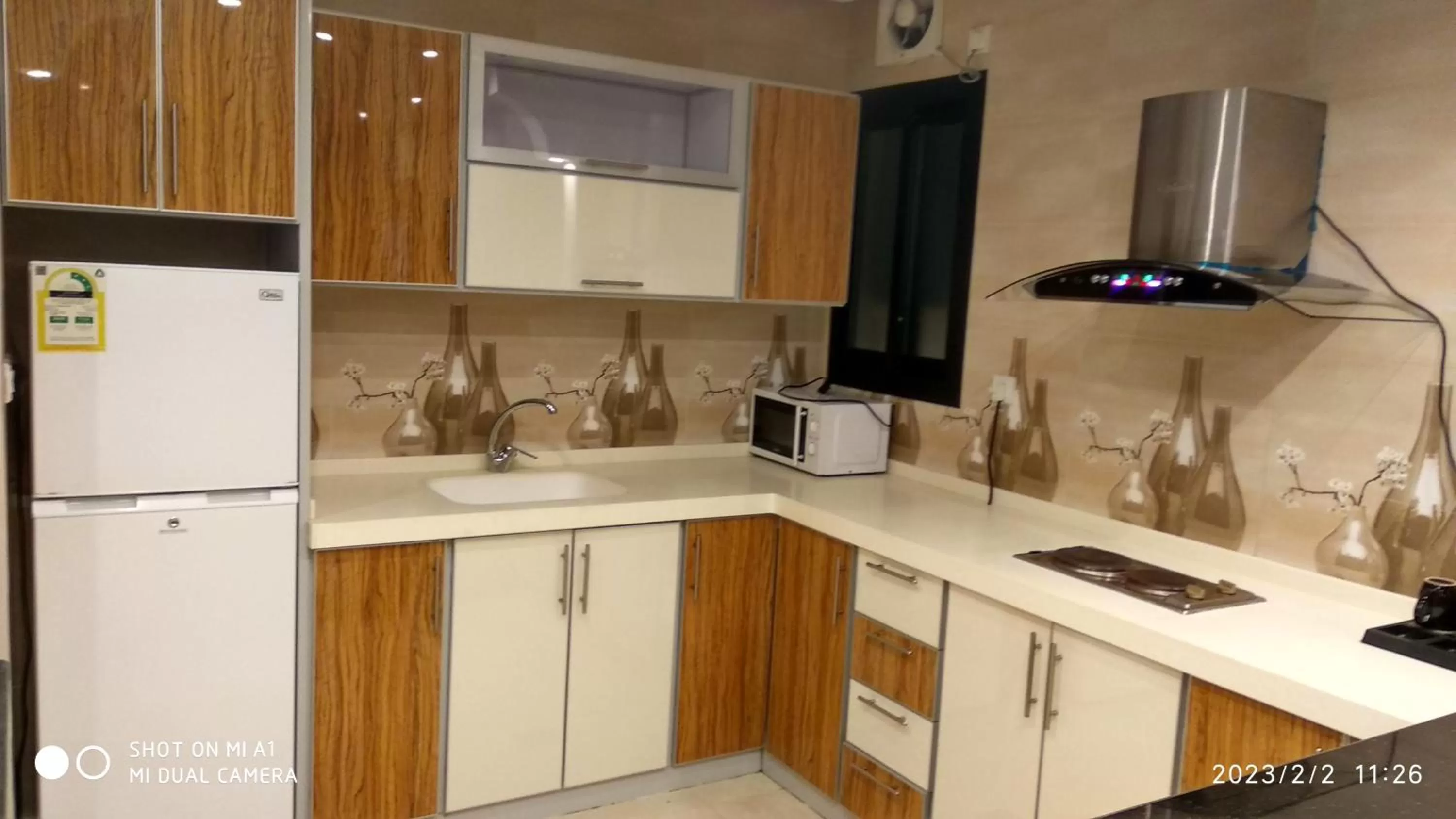 Kitchen or kitchenette in يان للشقق المخدومة - Yan Apartments