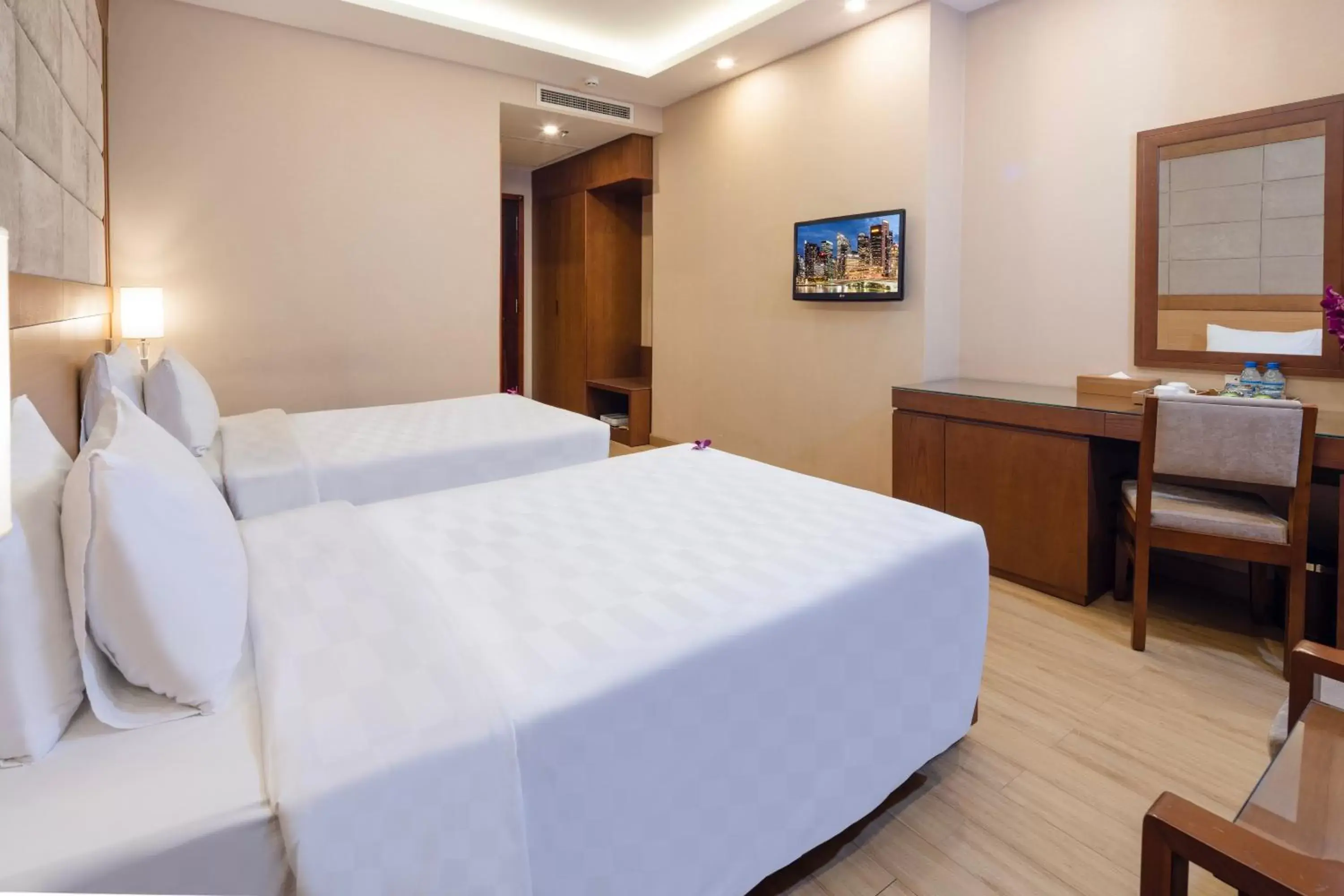Bed in Eden Star Saigon Hotel