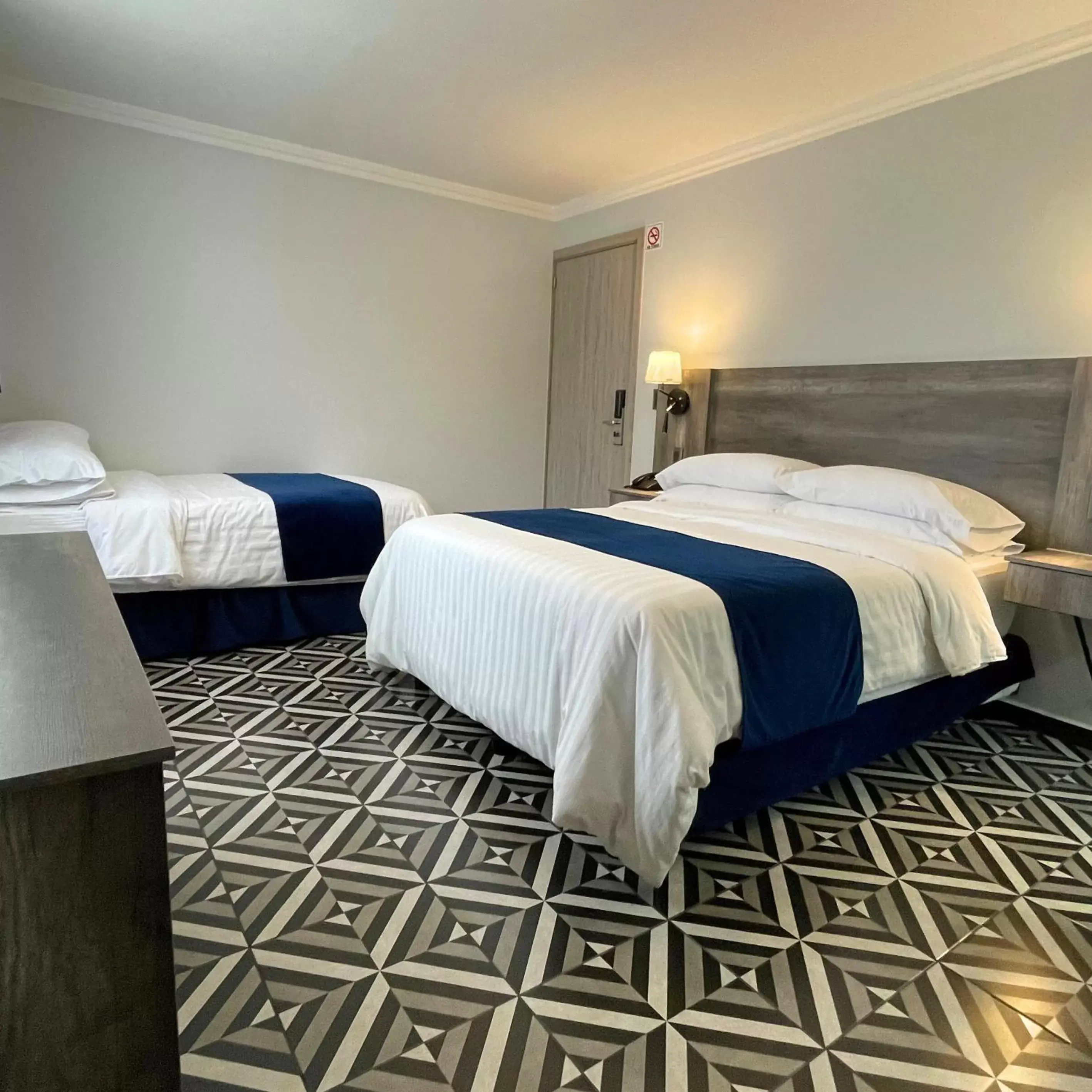 Bed in Hotel Esfera Tulancingo