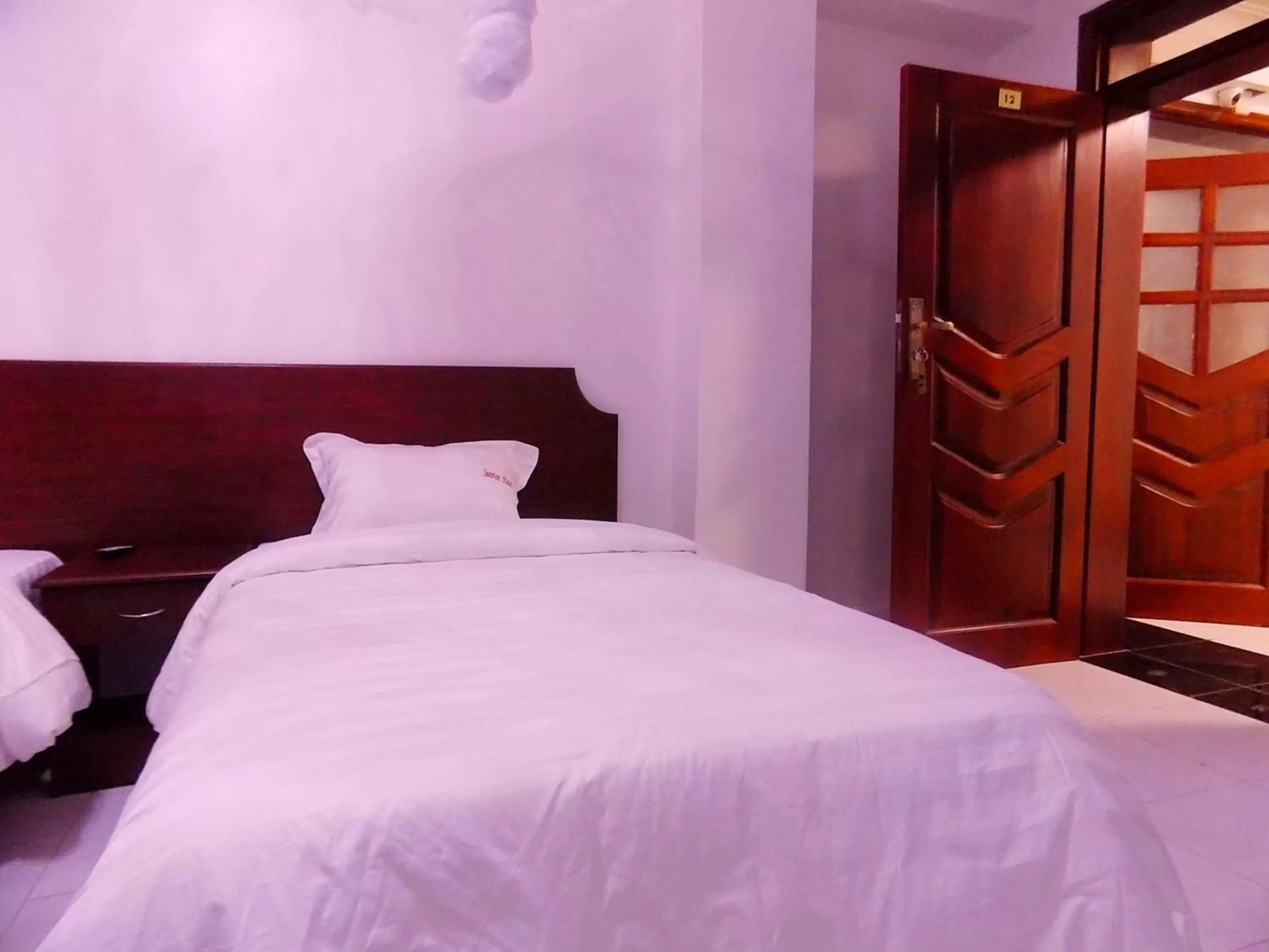 Bed in Sunrise Hotel Kampala