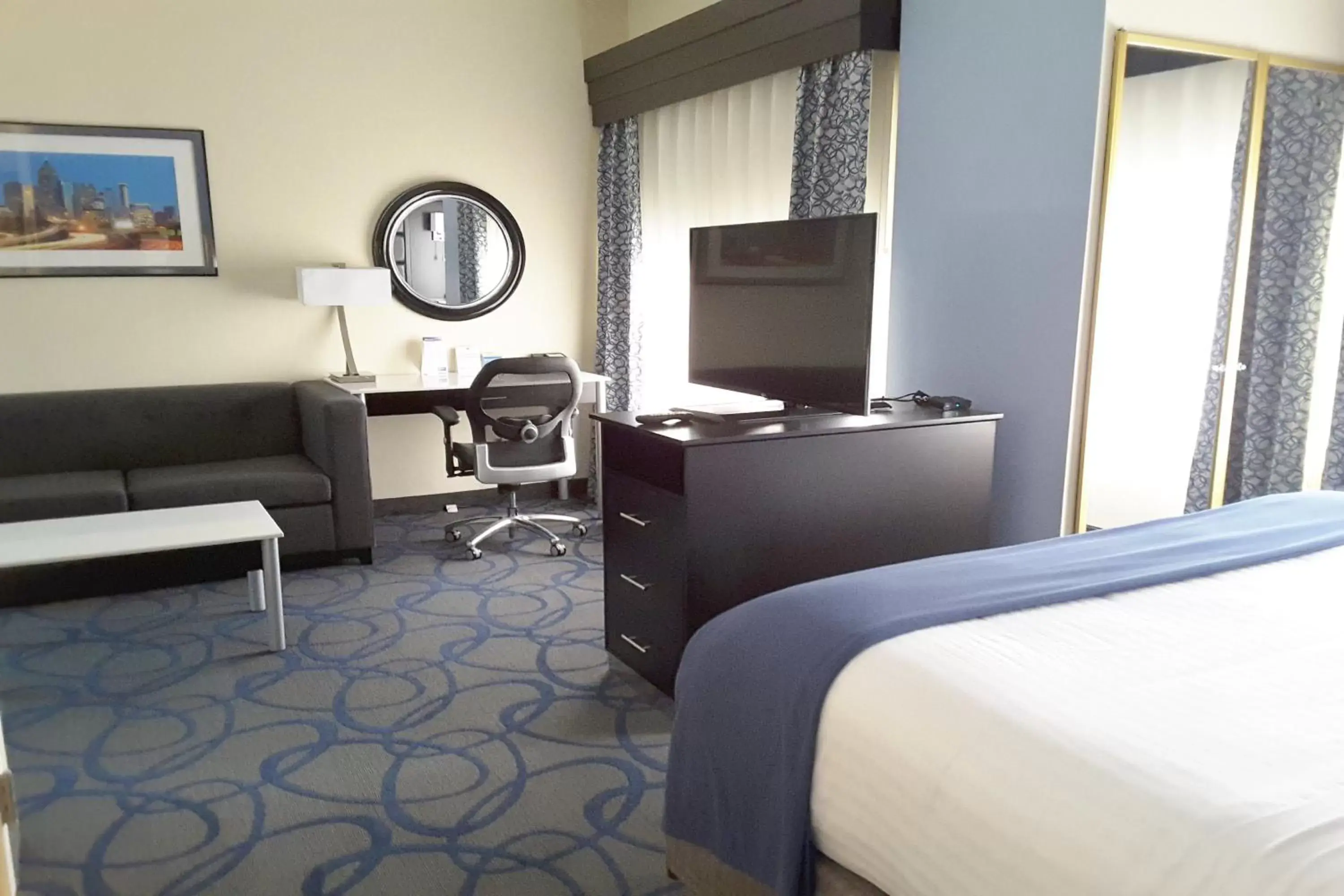 Photo of the whole room, TV/Entertainment Center in Holiday Inn Express Hotel & Suites Lawrenceville, an IHG Hotel
