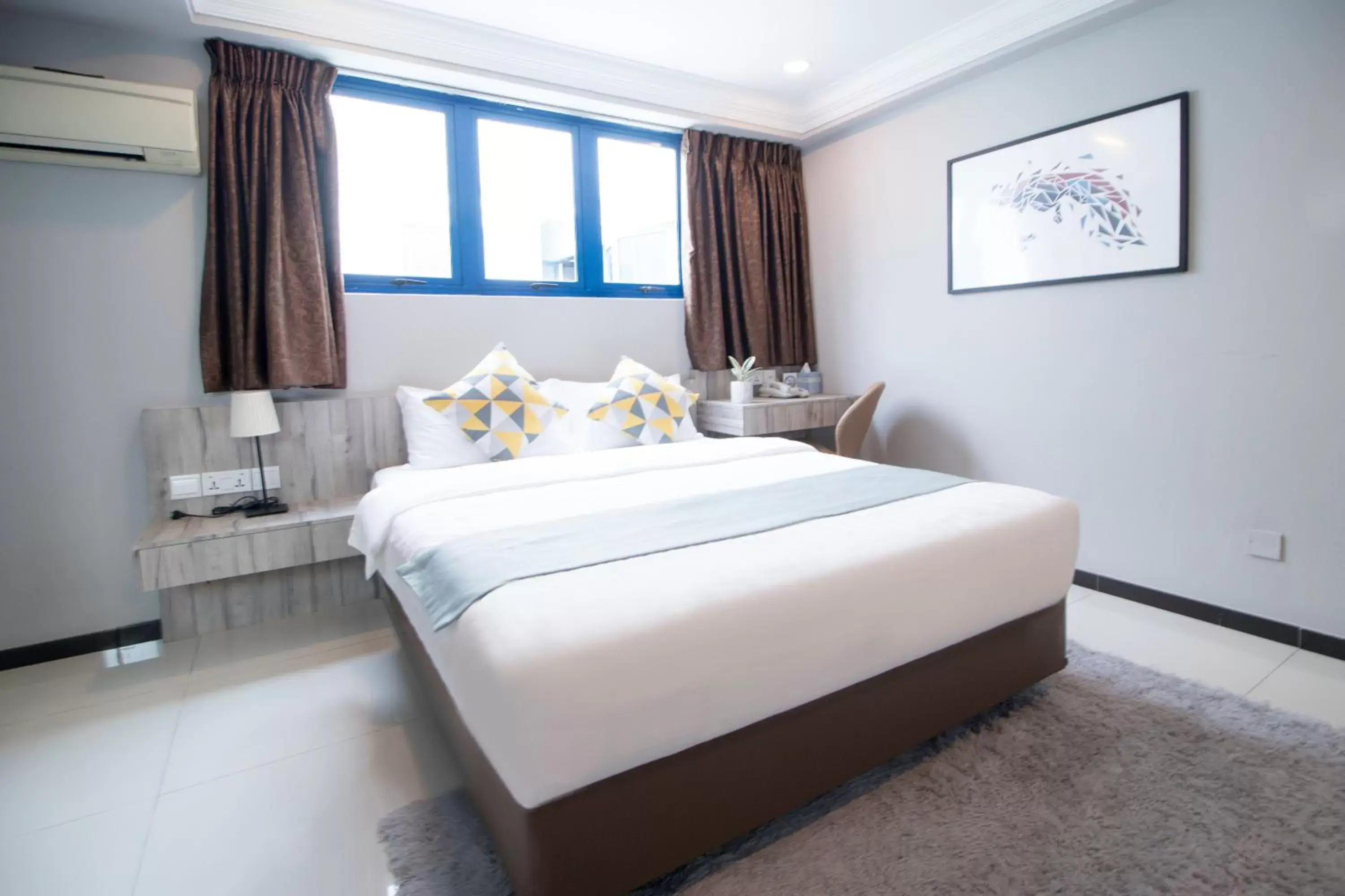 Bedroom in Harbour Ville Hotel