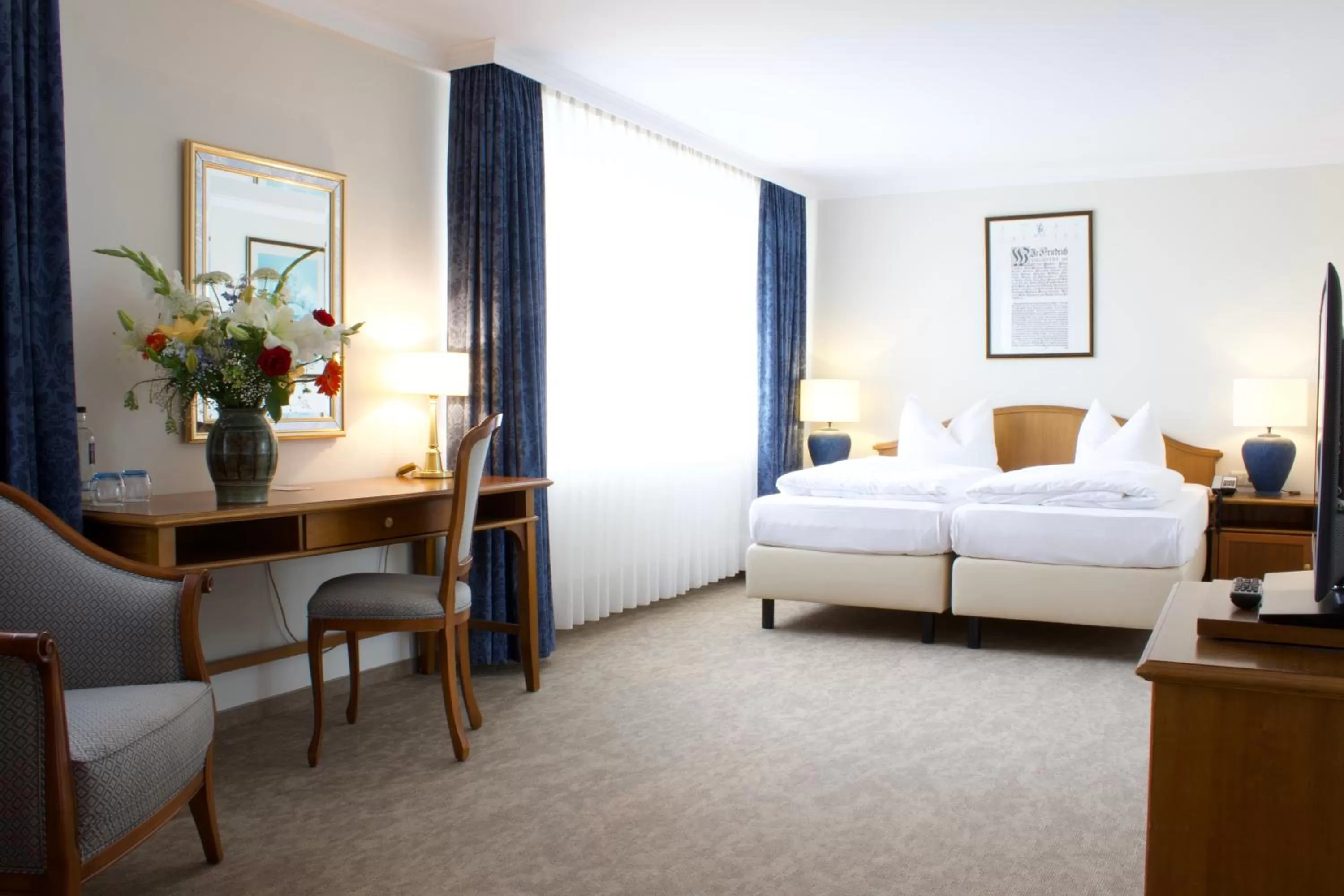 Photo of the whole room, Bed in Dorint Parkhotel Meißen