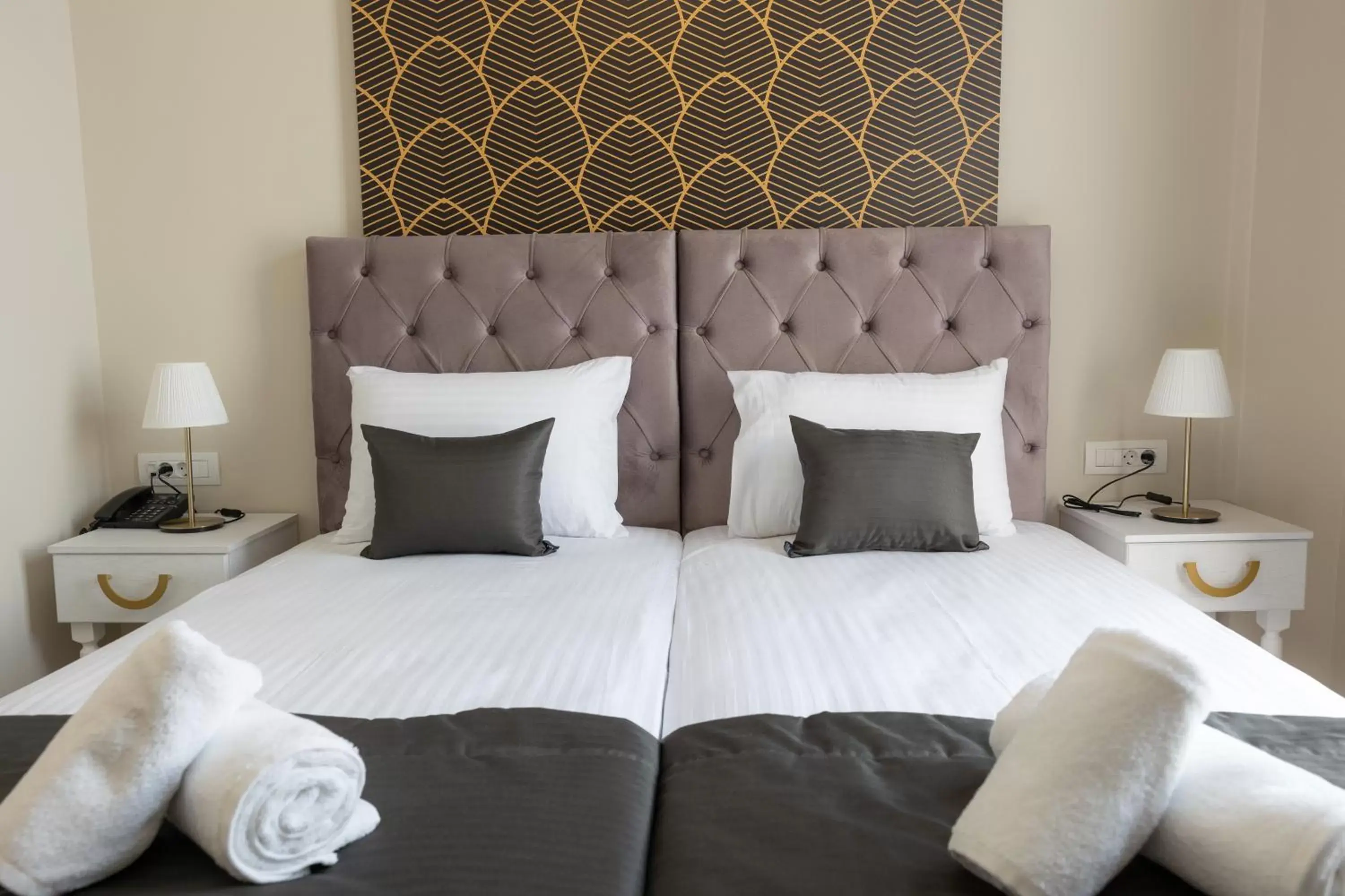Bed in Modern Revival Luxury Hotel