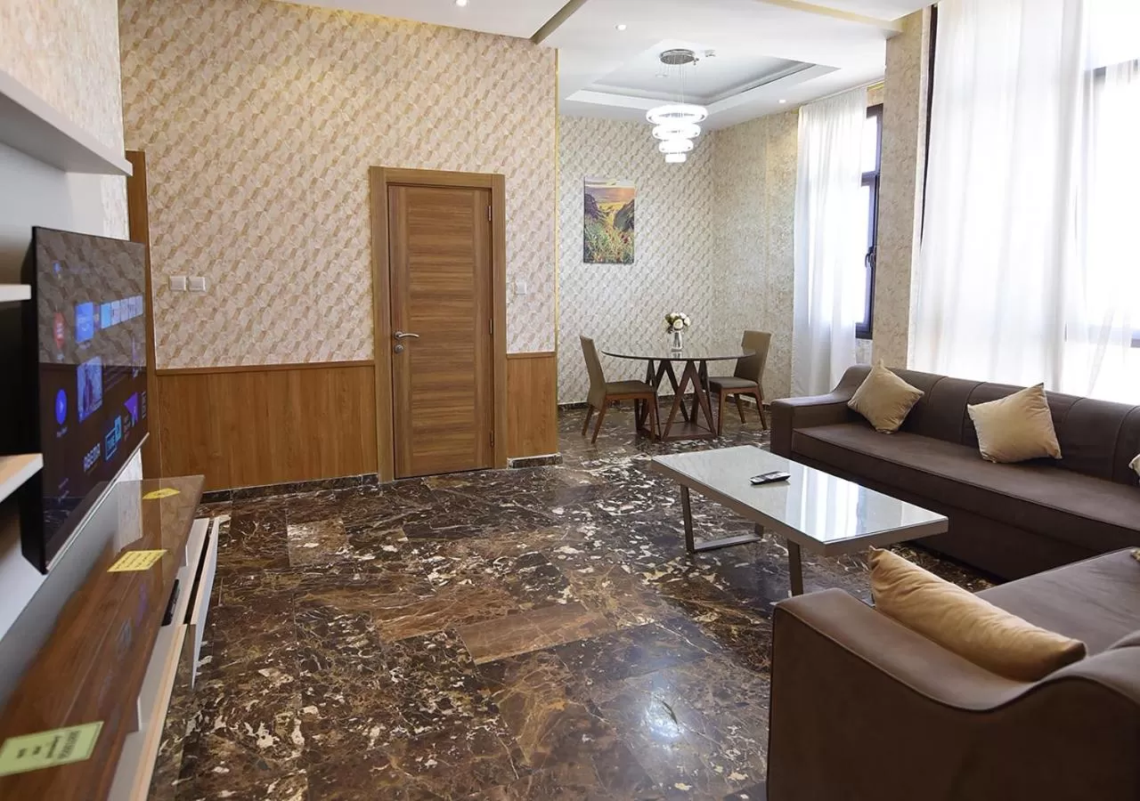 Communal lounge/ TV room, Seating Area in Rihanna Hotel Apartment