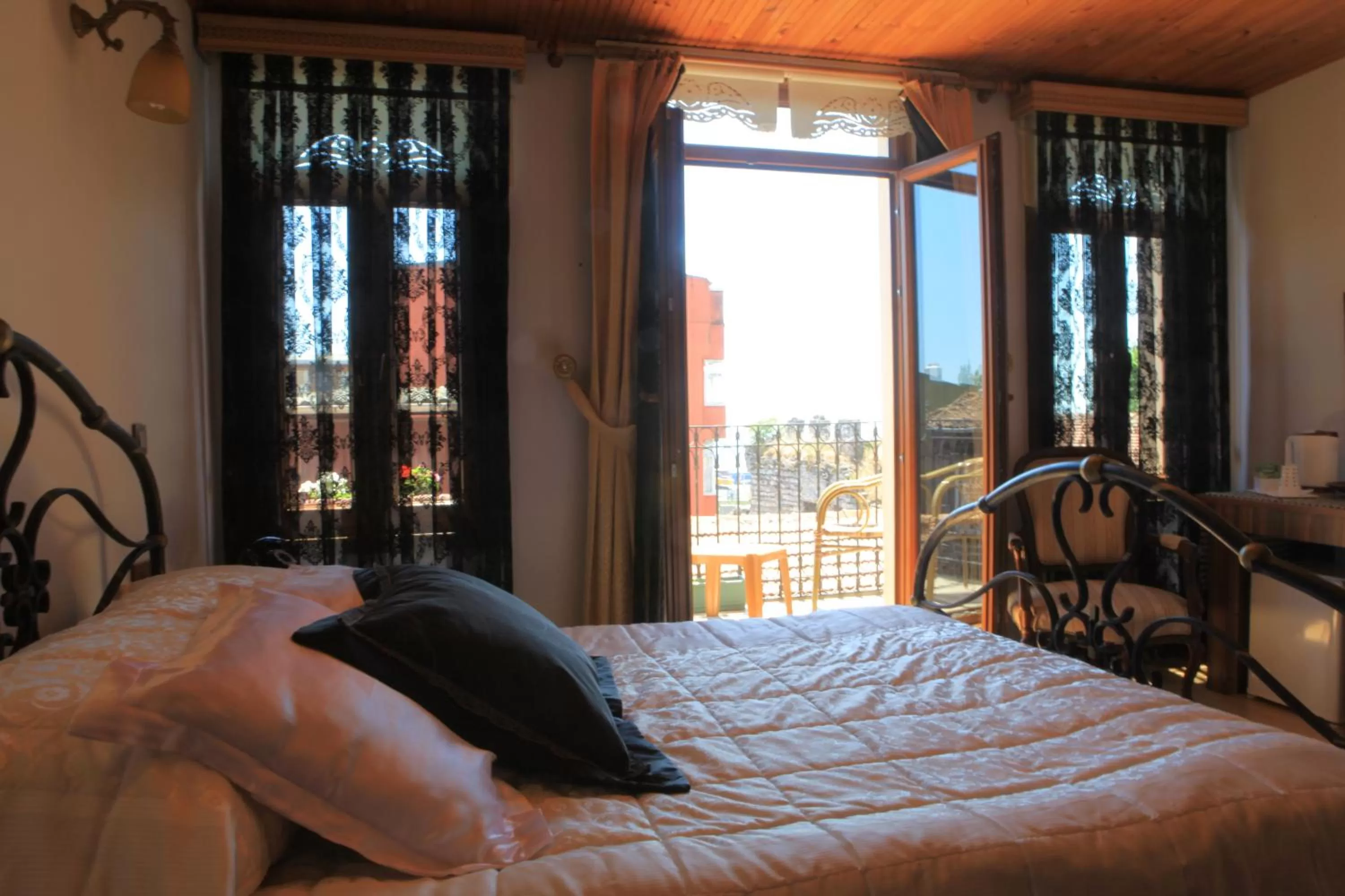 Photo of the whole room, Bed in Tom Square Boutique Hotel