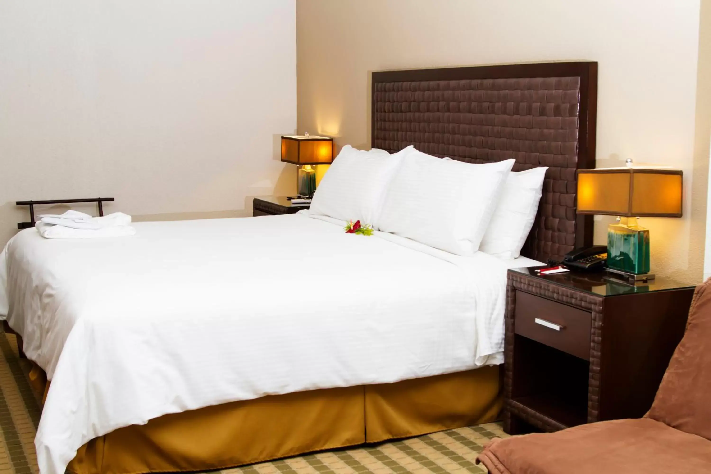 Bed in Rincon del Valle Hotel & Suites