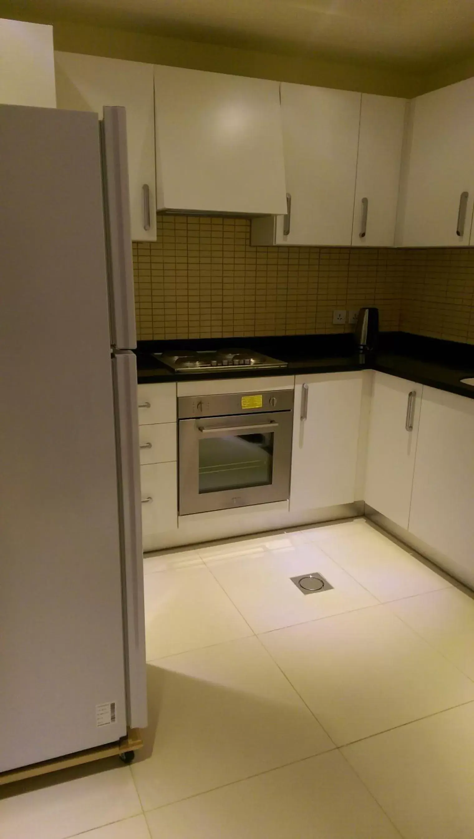 Property building, Kitchen/Kitchenette in MANAZEL Al DIAFA SERVICED APARTMENTS