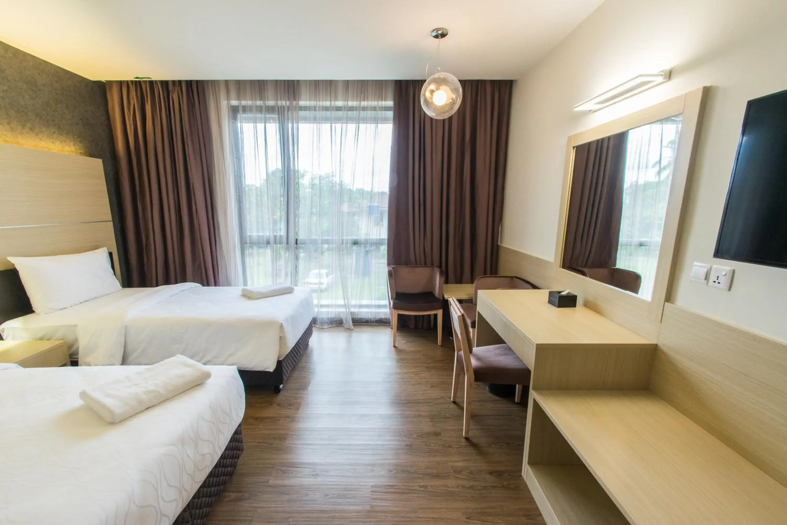 Bedroom, Seating Area in Hotel Labuan Point