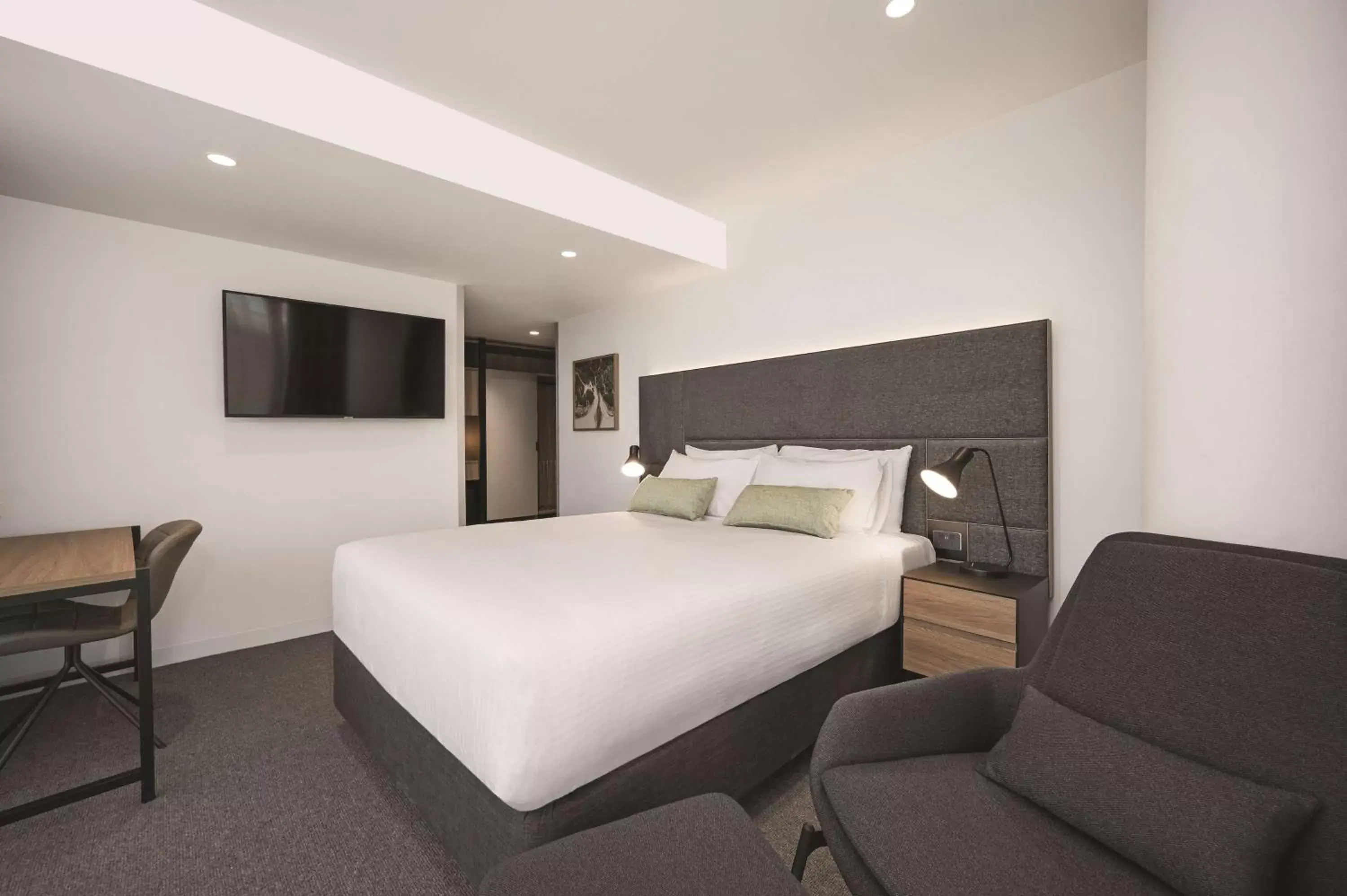 Bedroom in Vibe Hotel Melbourne