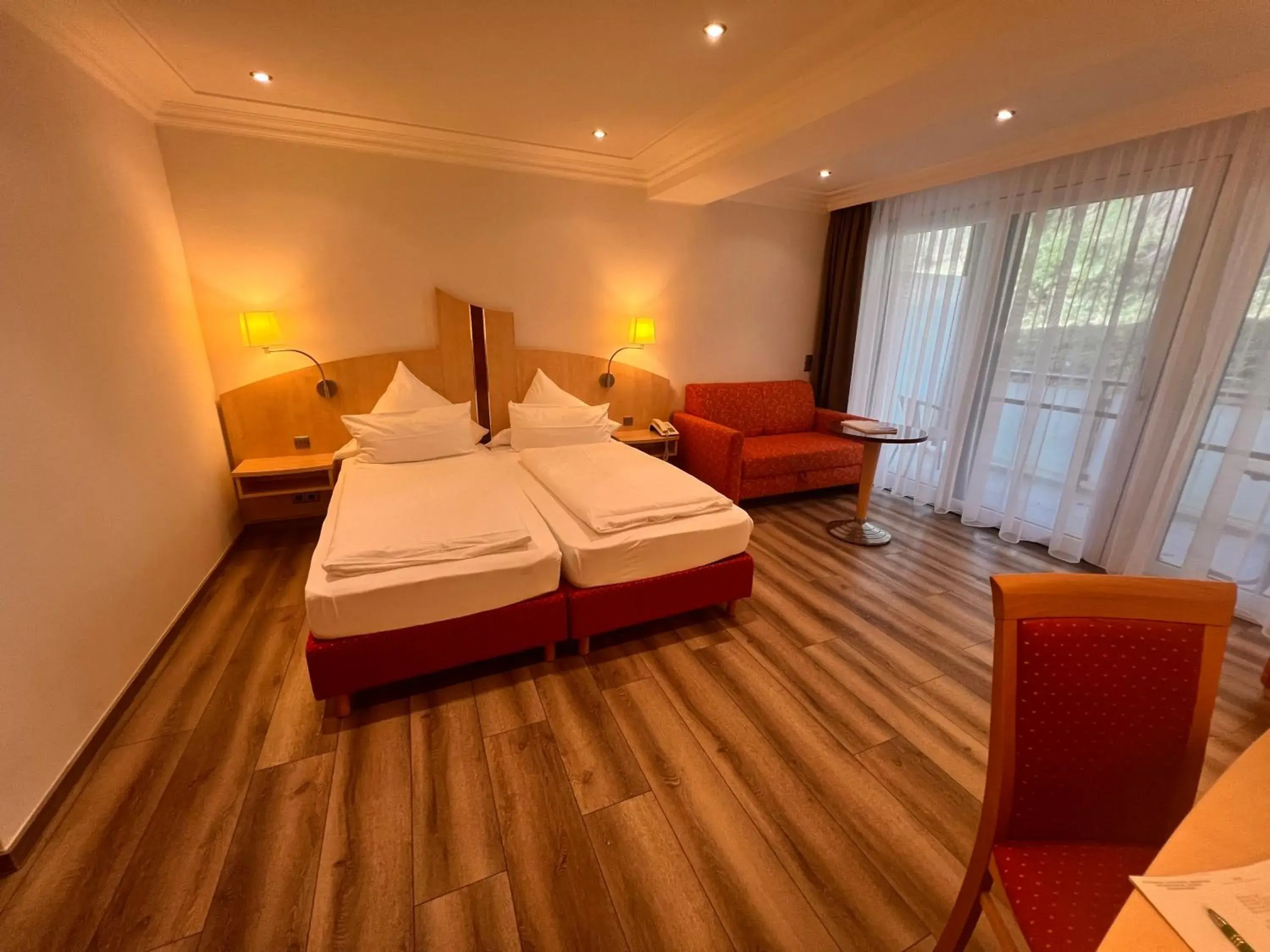 Photo of the whole room, Bed in Landhotel Heimathenhof