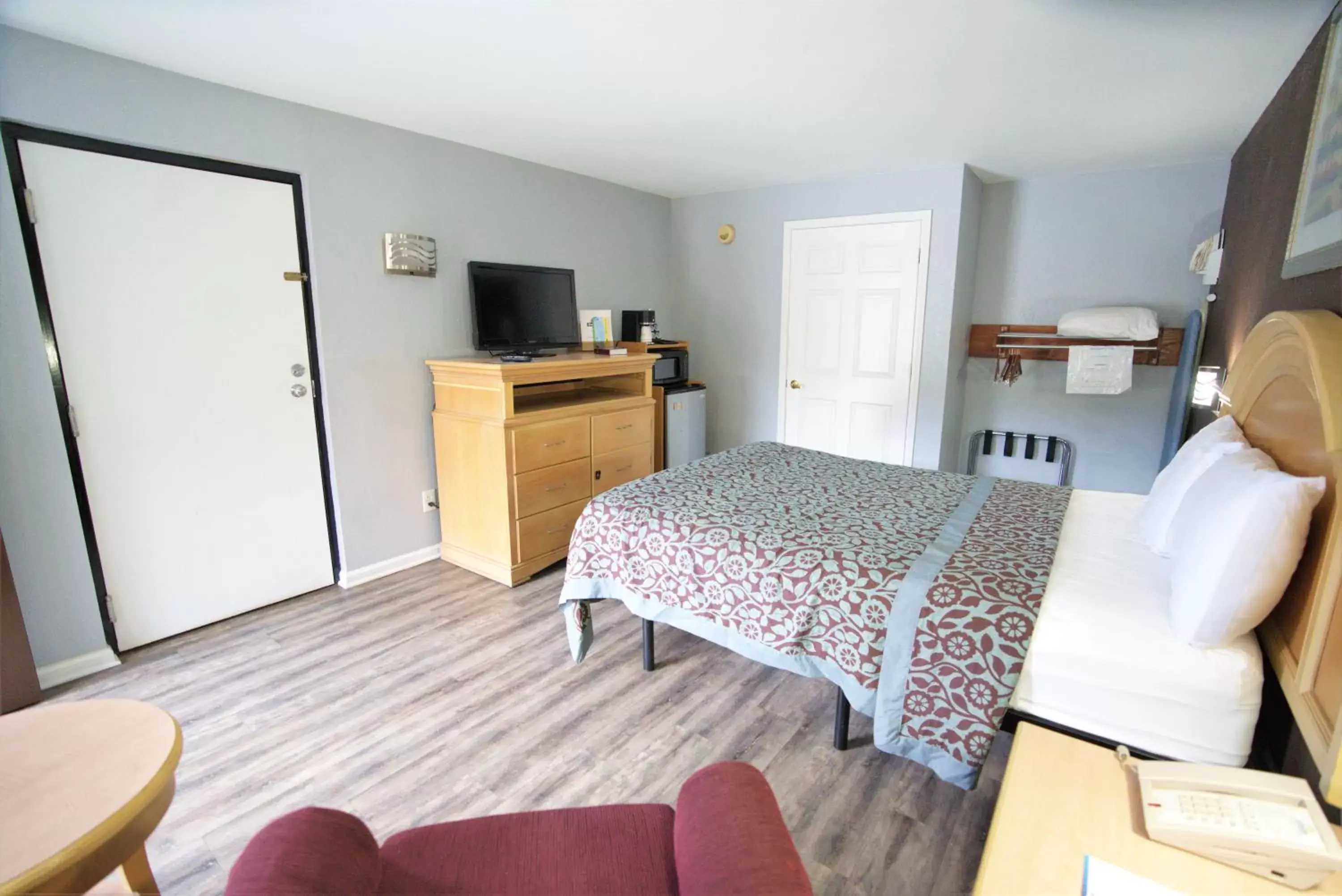 Bedroom in Columbus Inn and Suites