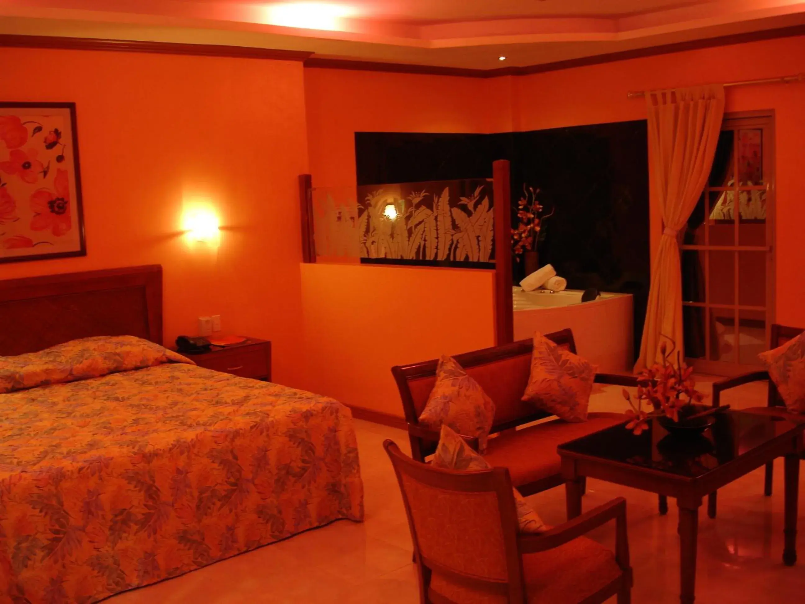 Photo of the whole room, Bed in Pacific Breeze Hotel and Resort Photo of the whole room, Bed in Pacific Breeze Hotel and Resort