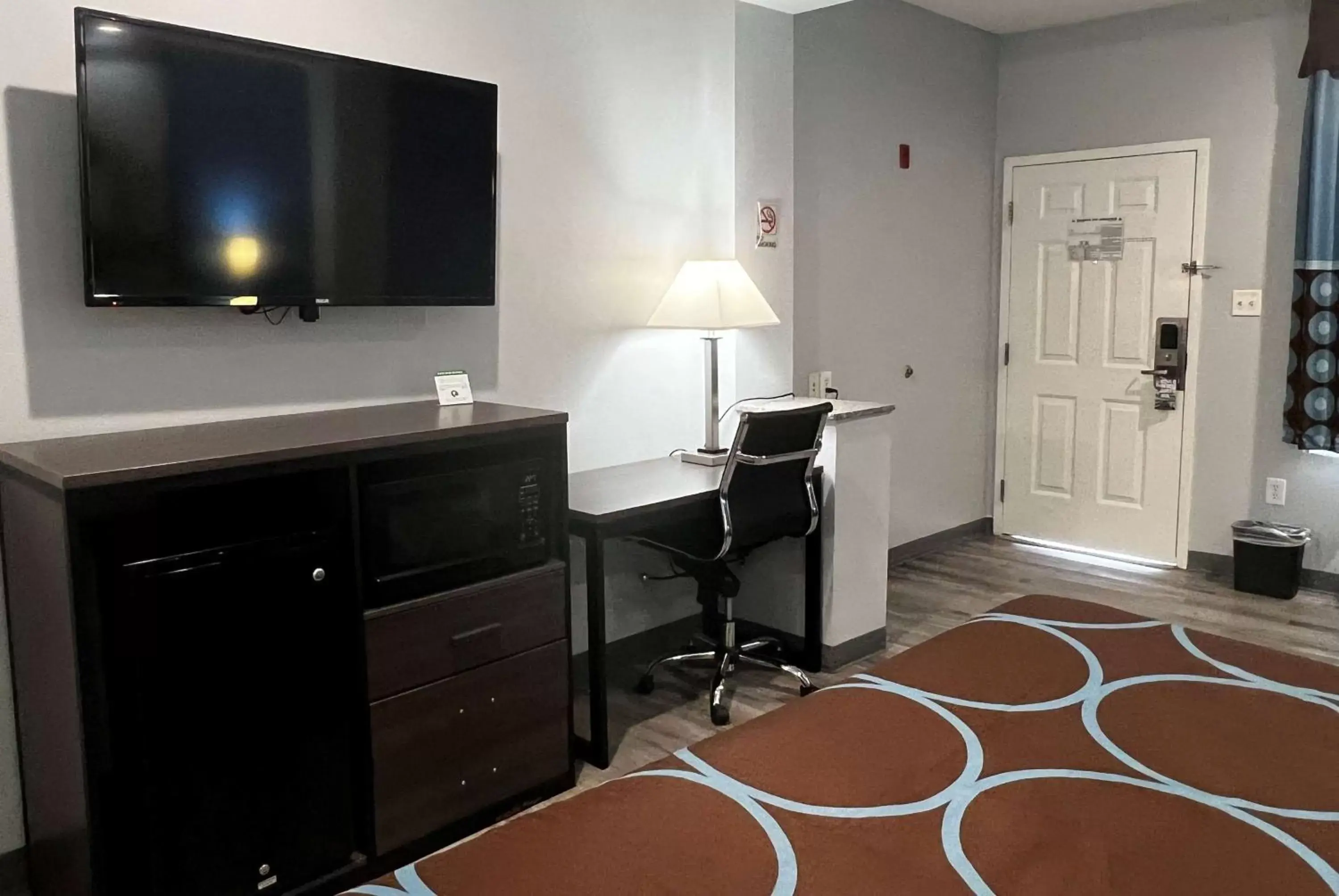 Photo of the whole room, TV/Entertainment Center in Super 8 by Wyndham Houston North I-45