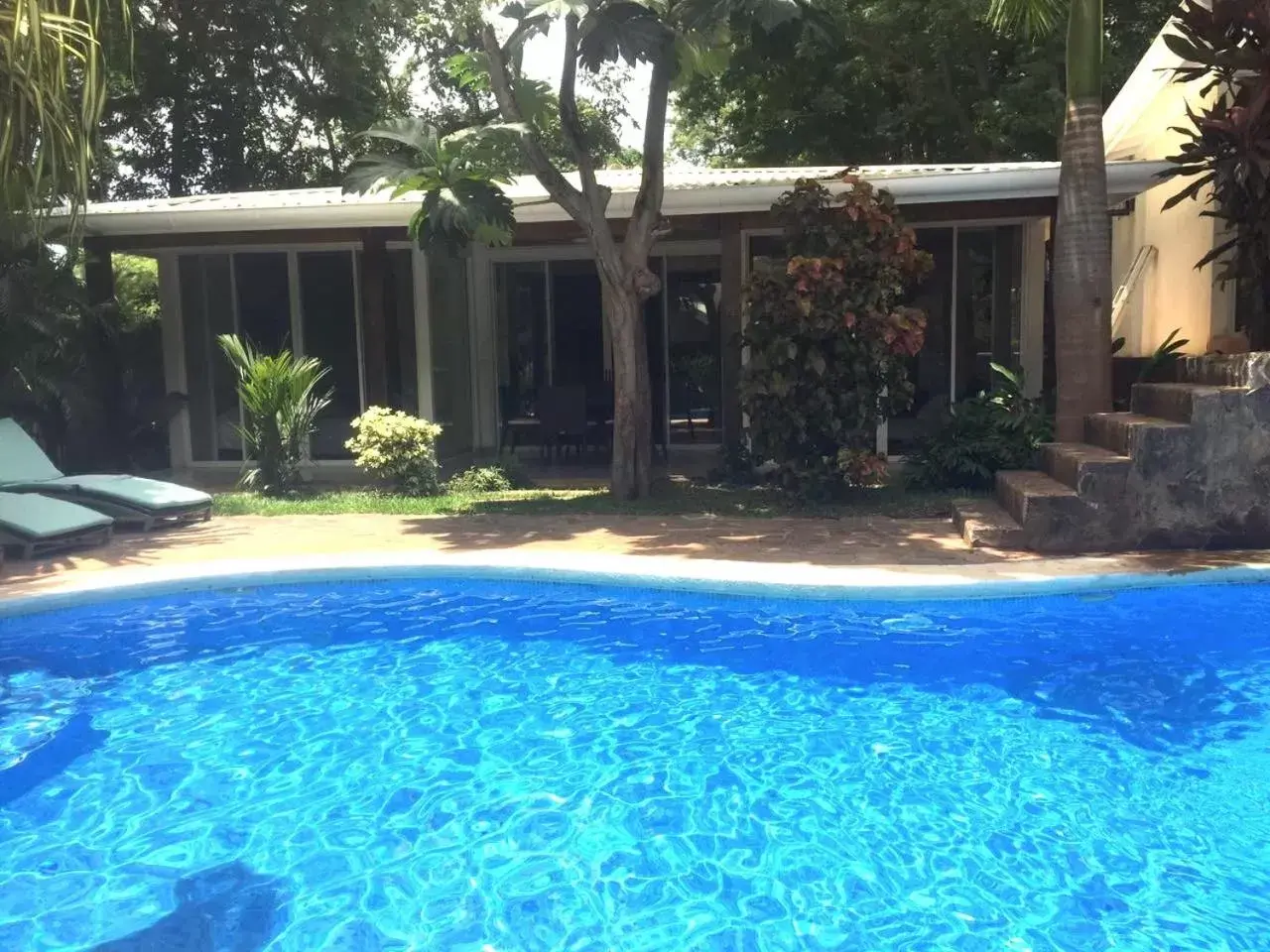 Garden, Swimming Pool in The Breeze Hotel & Villas