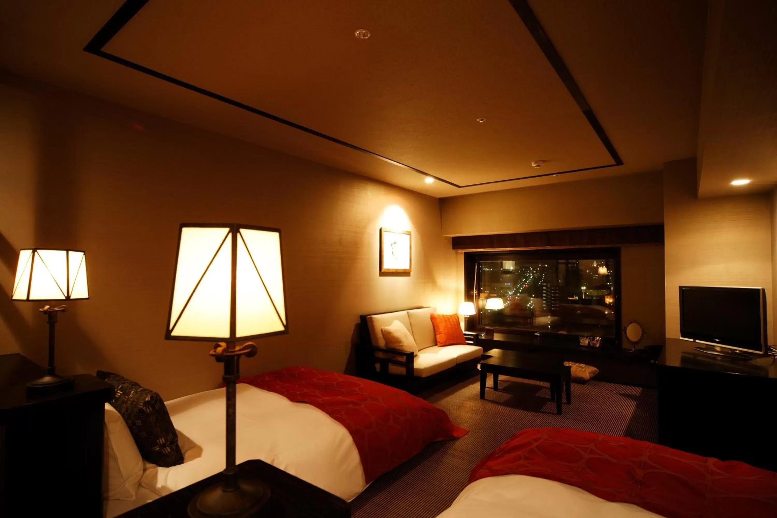 Bed, Seating Area in La Vista Hakodate Bay