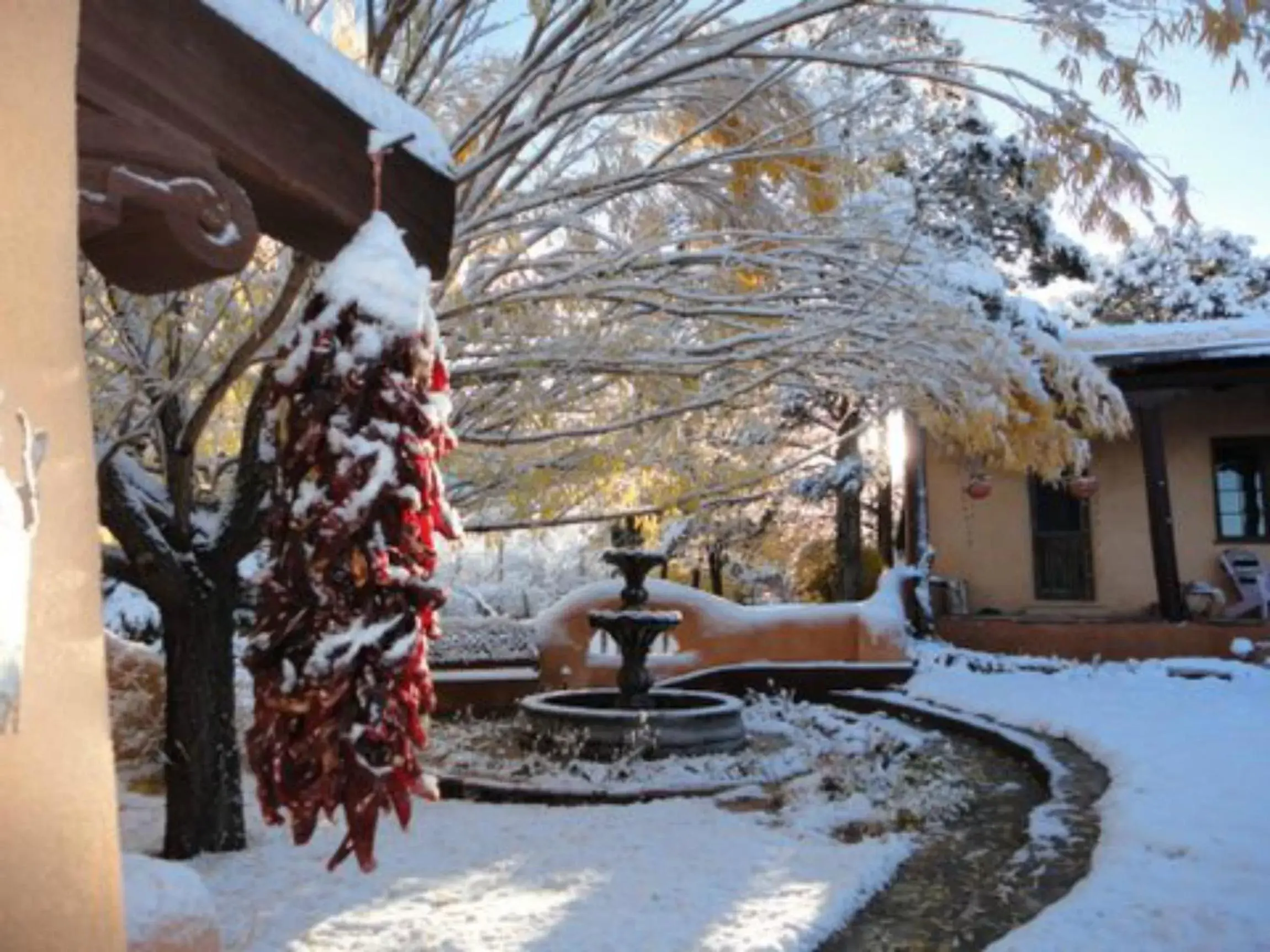 Facade/entrance, Winter in Old Taos Guesthouse B&B