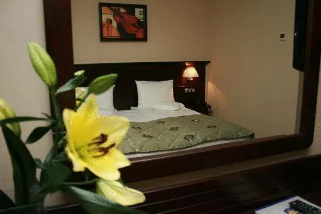 Bed in Hotel Rapsodia City Center
