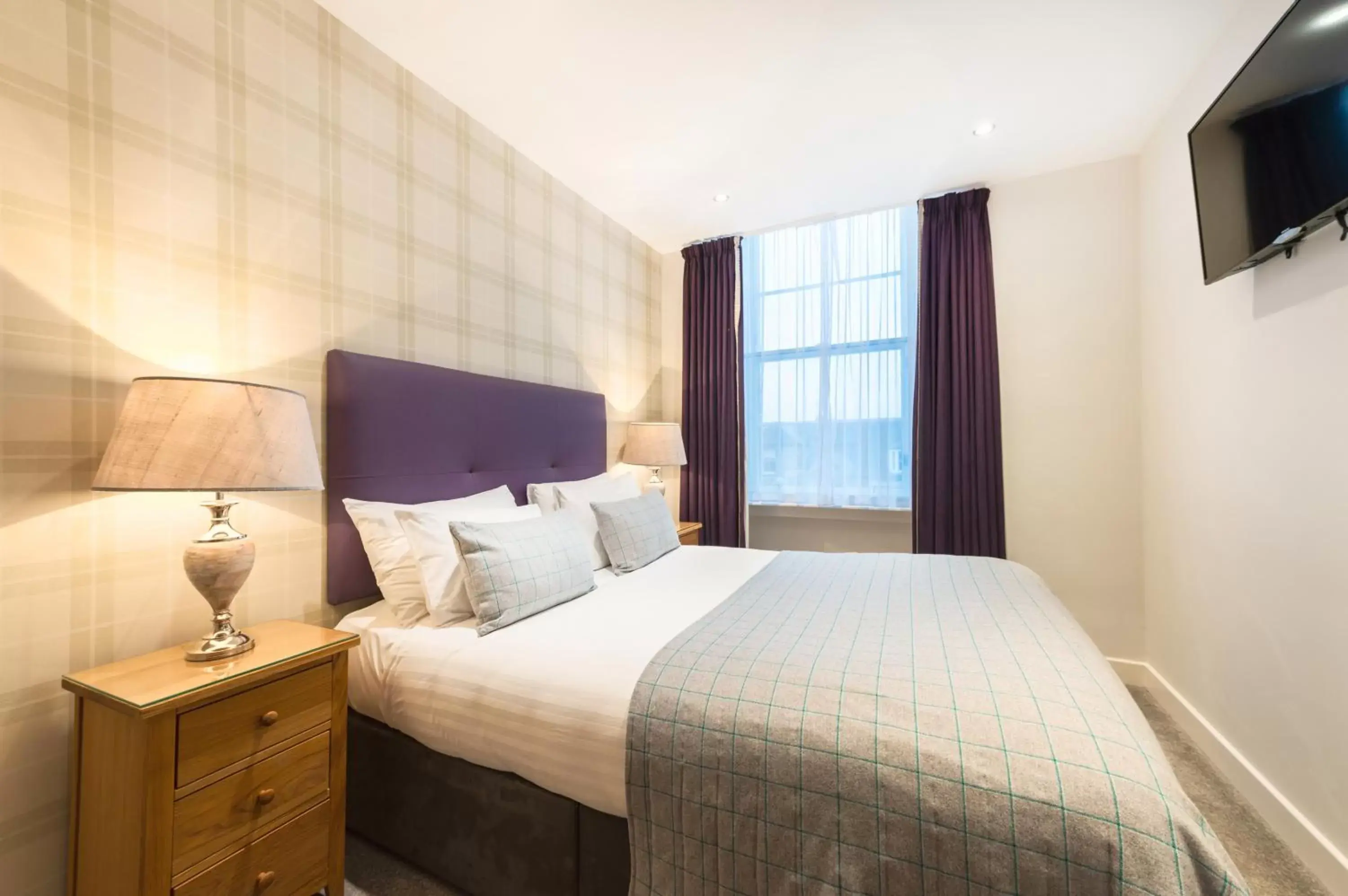 Bed in Braid Apartments by Mansley