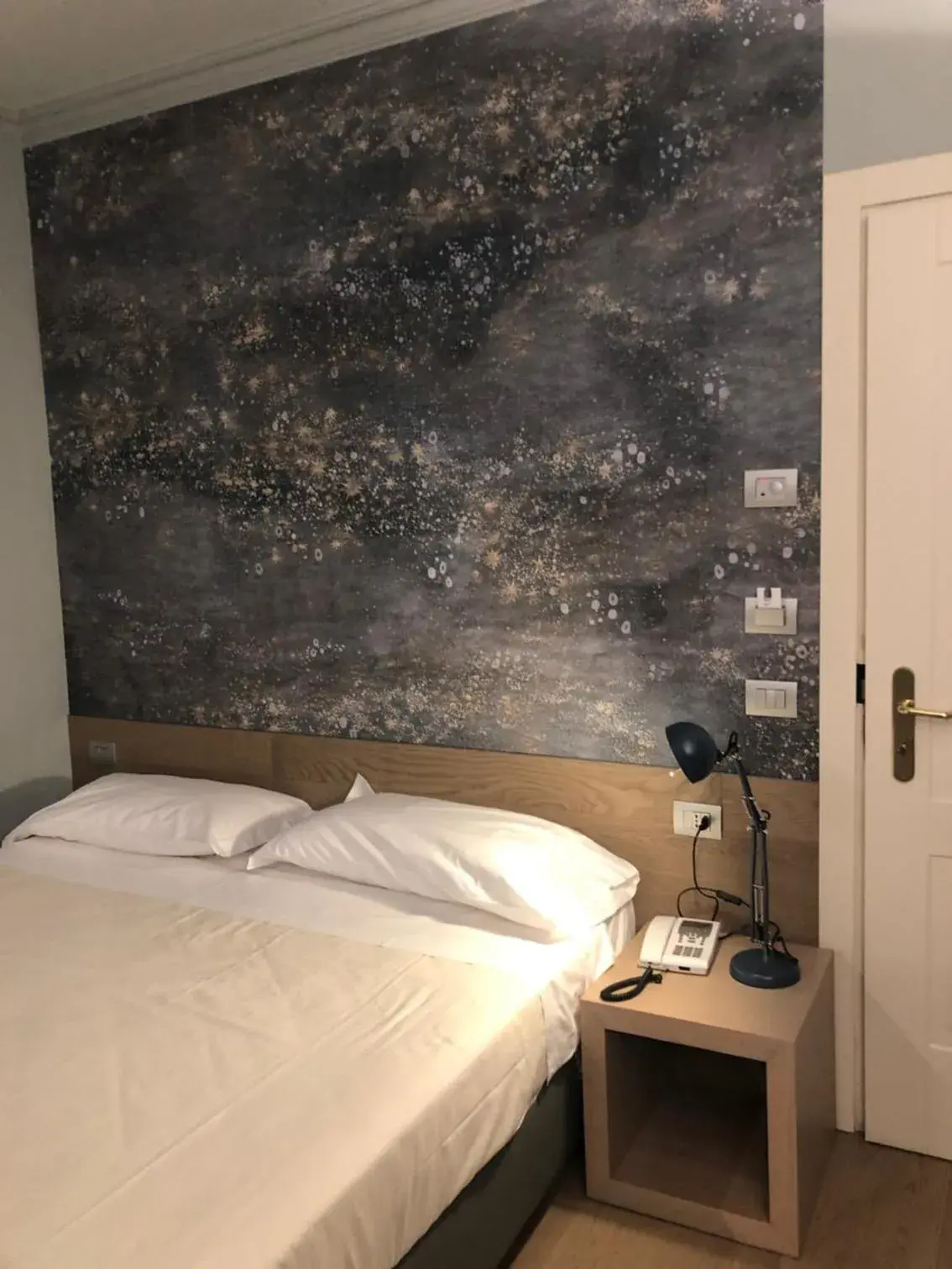 Bed in Albergo Tre Pozzi