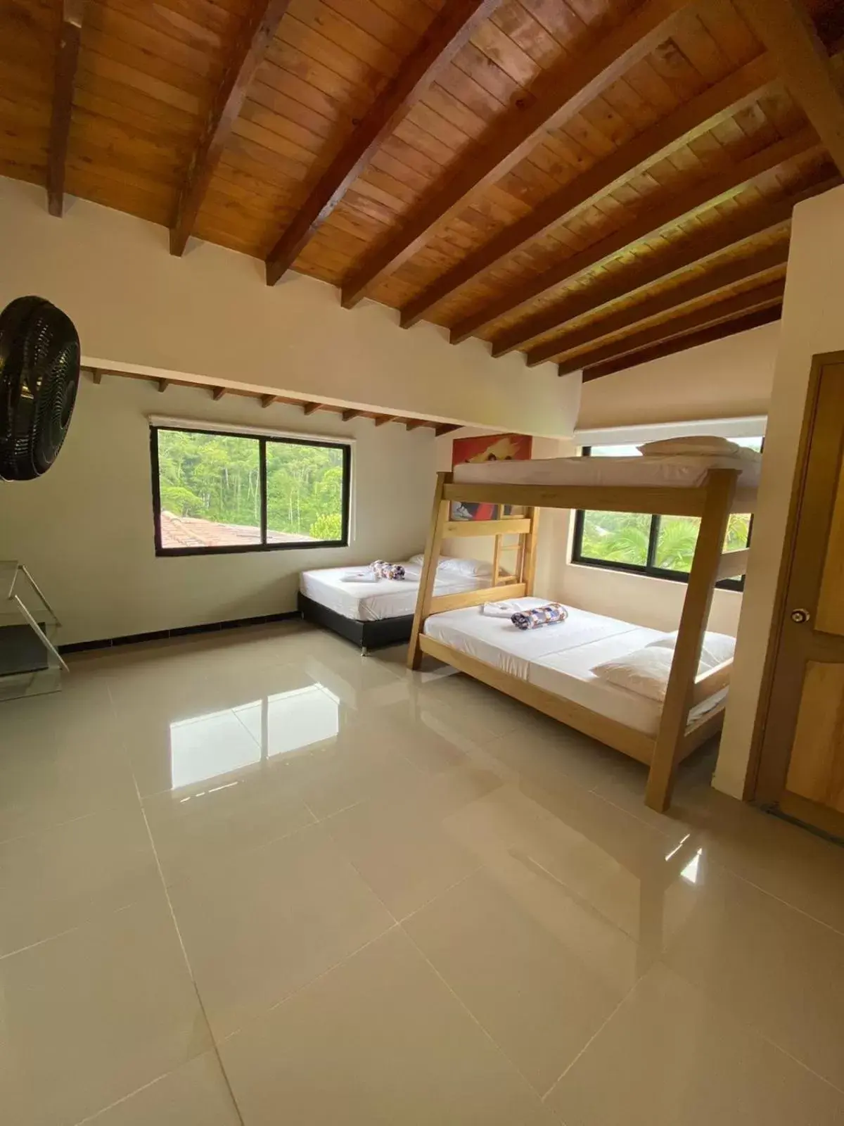 Triple Room with Bathroom in Hostería Blanco y Negro Triple Room with Bathroom in Hostería Blanco y Negro