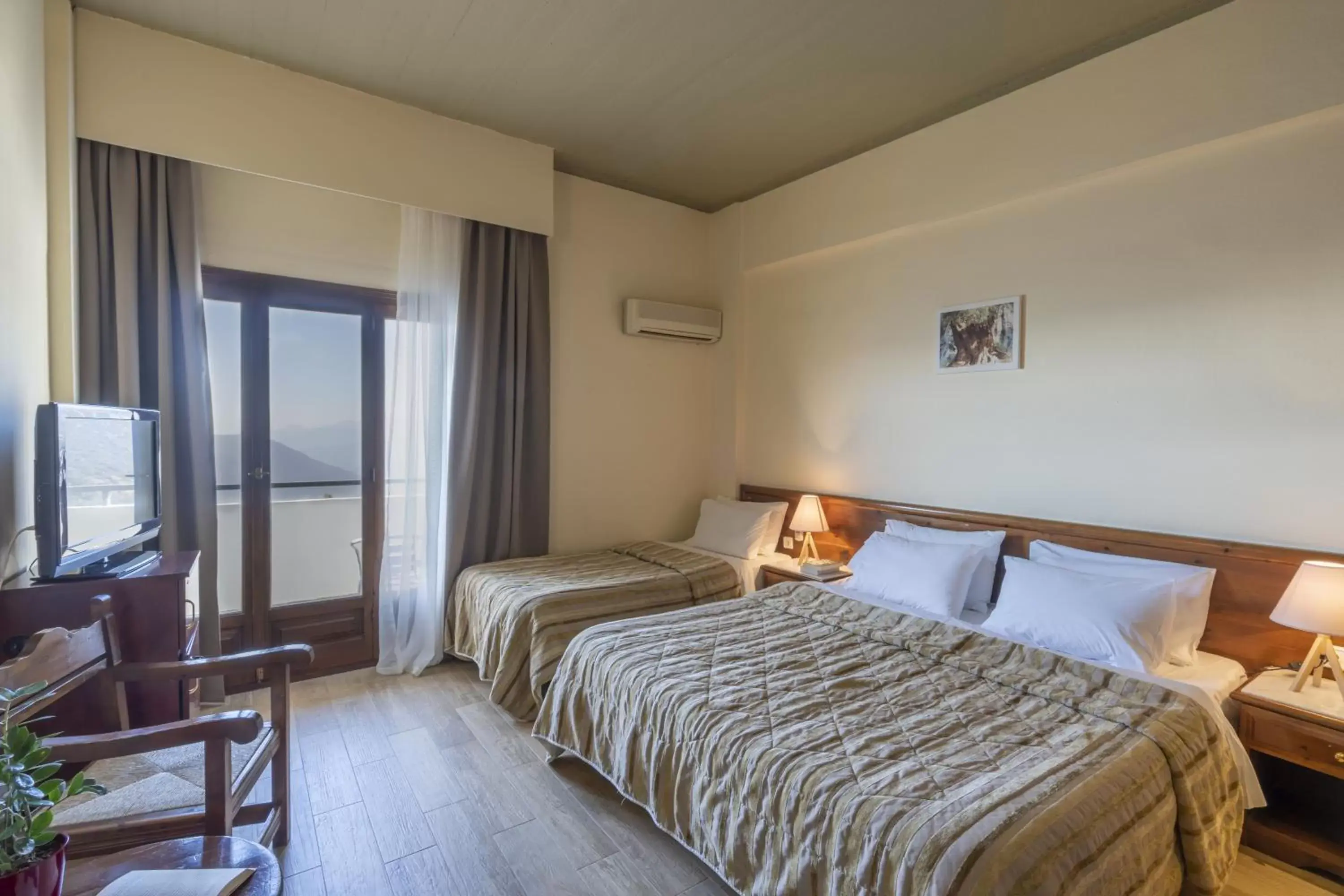 Photo of the whole room, Bed in Domotel Anemolia Mountain Resort