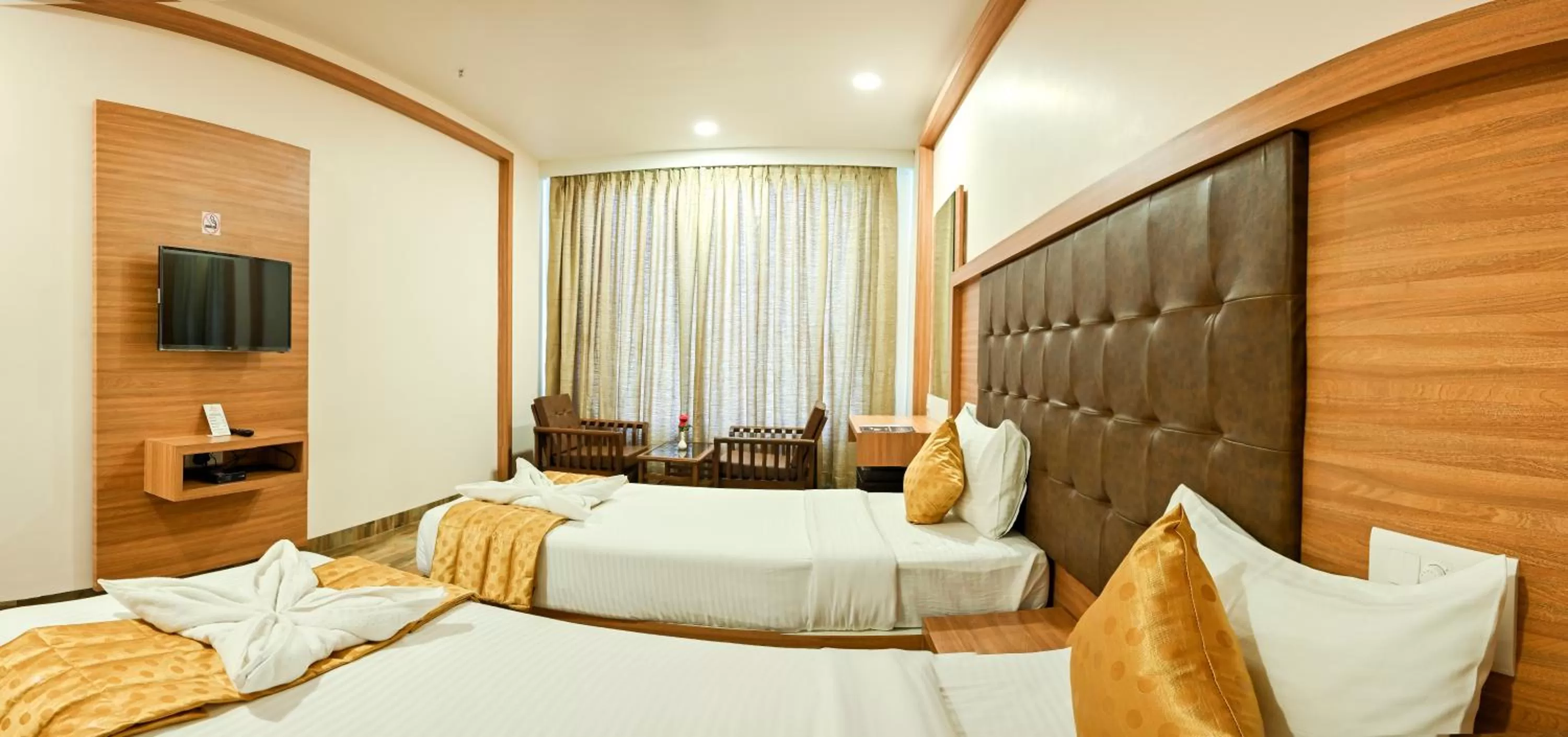 Photo of the whole room, Bed in Hotel Laxmi Empire