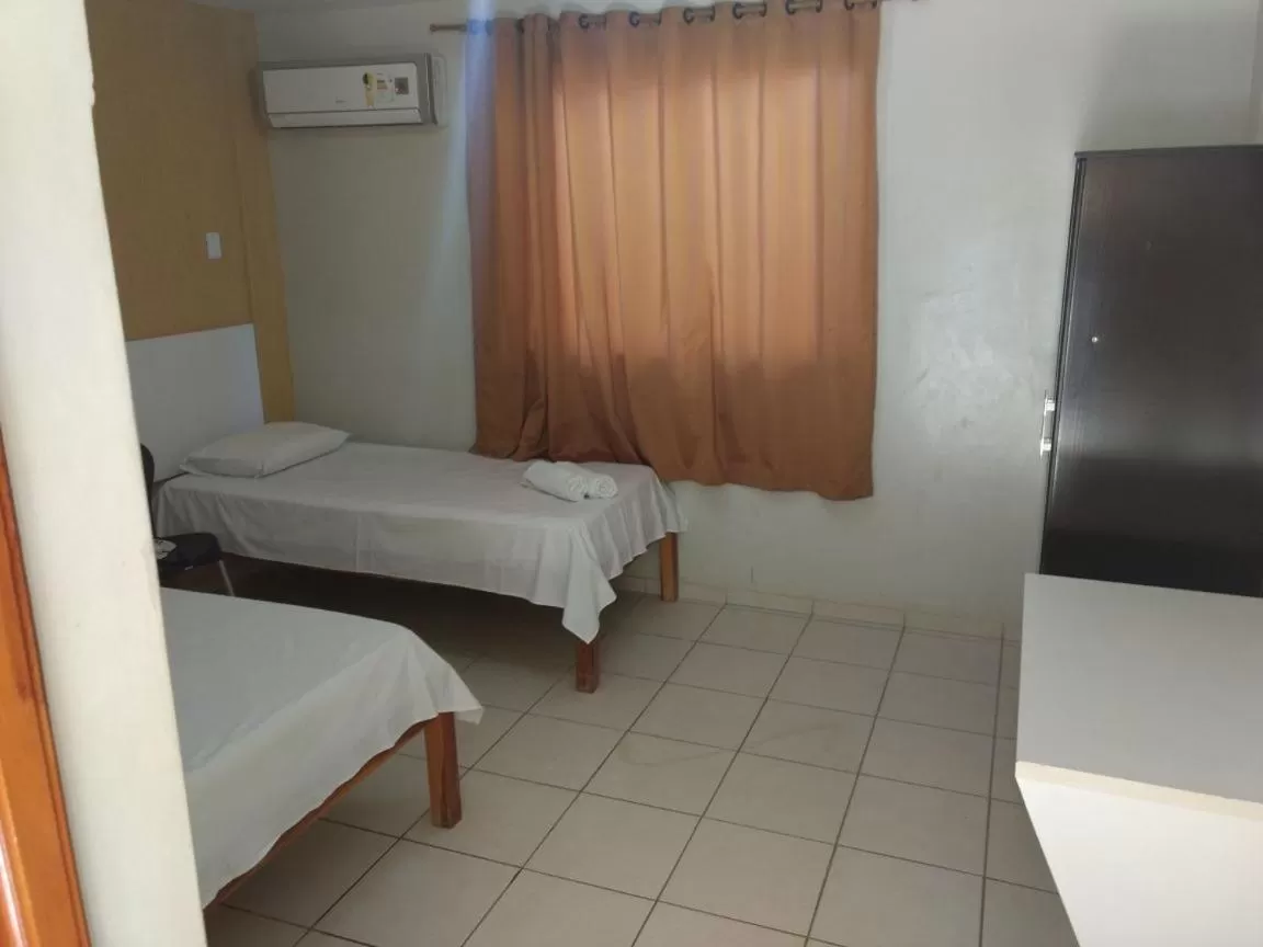 Bed in Hotel Serra do Rio