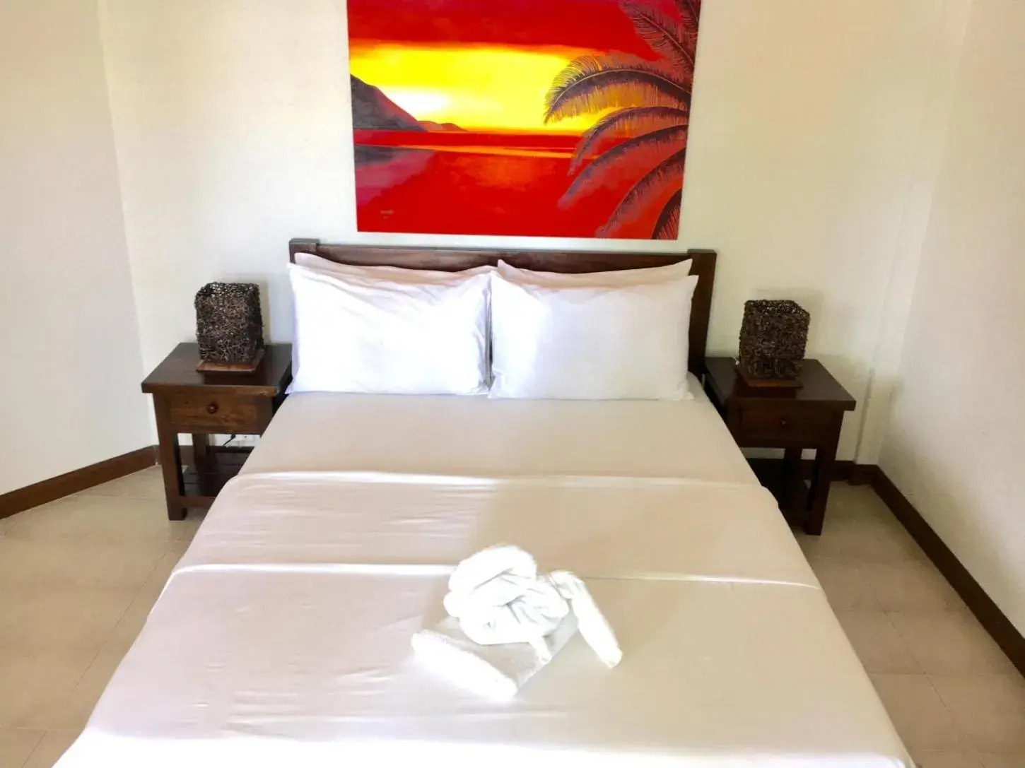 Bed in Sunset At Aninuan Beach Resort