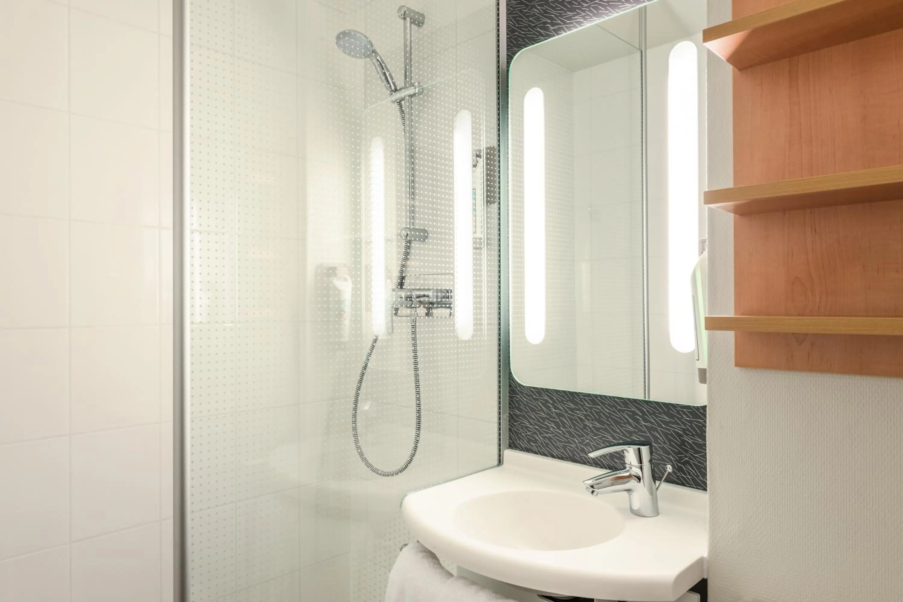 Bathroom in ibis Cergy Pontoise Le Port