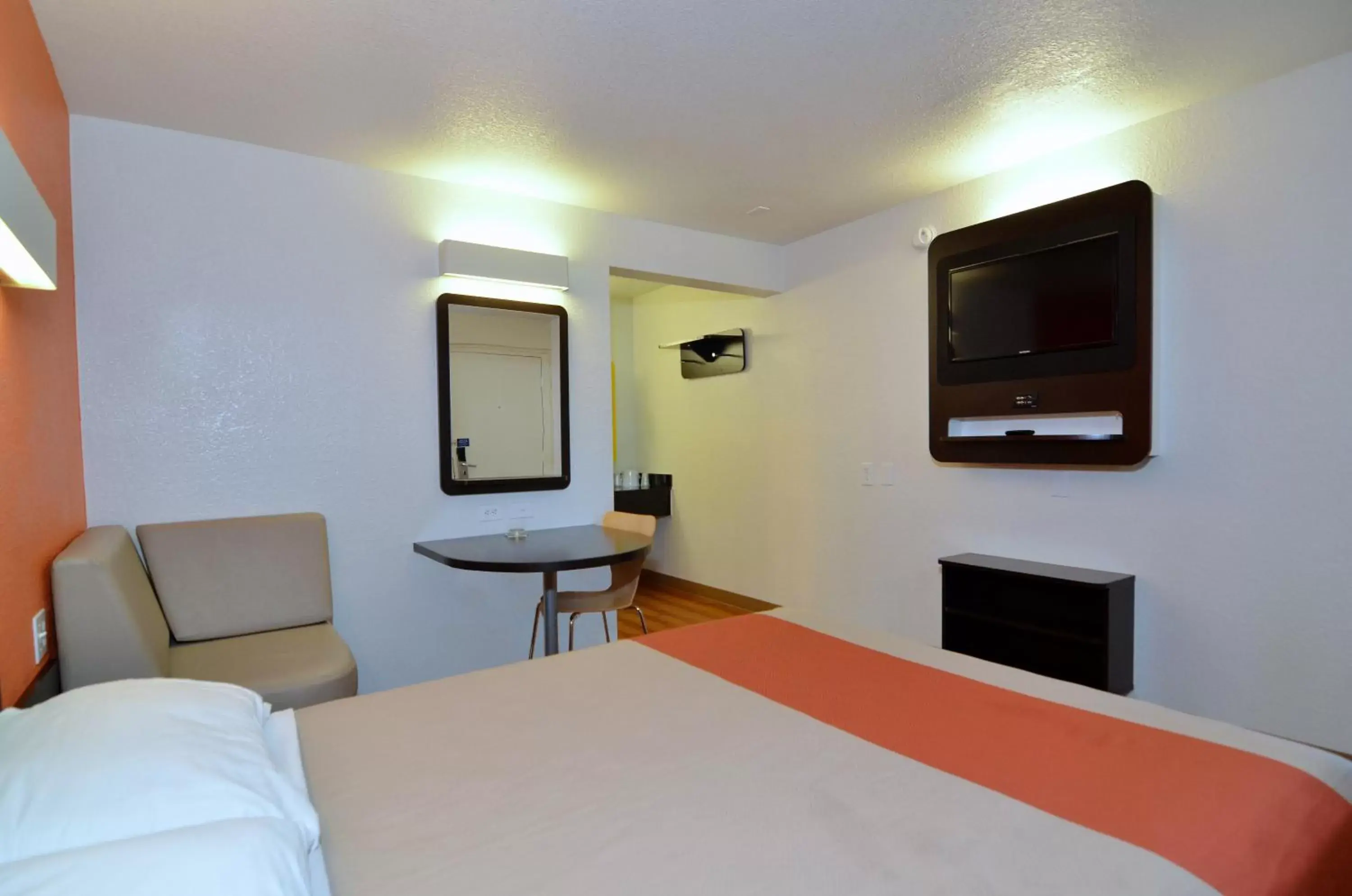 Photo of the whole room, TV/Entertainment Center in Motel 6-Palm Desert, CA - Palm Springs Area
