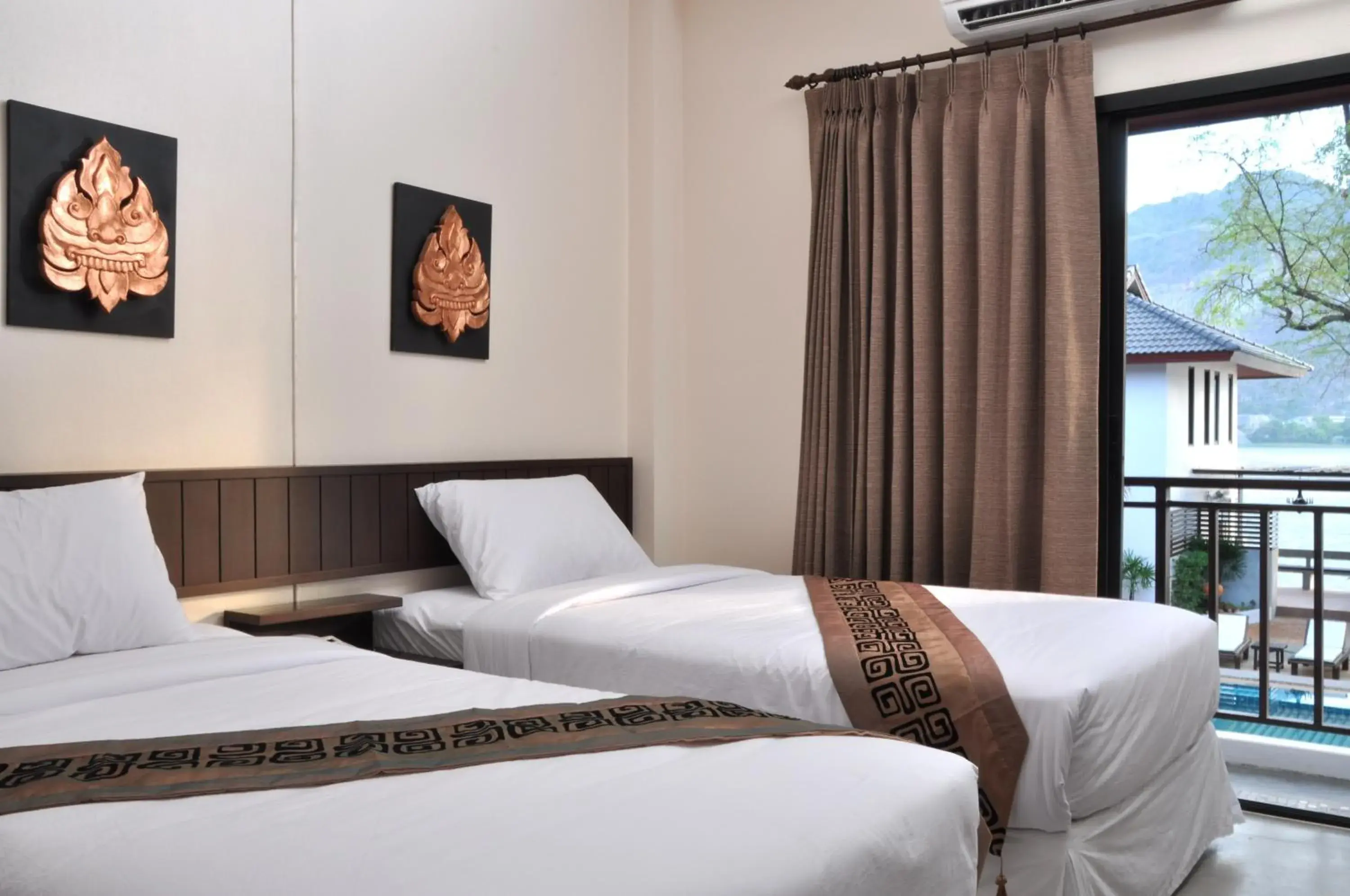 Bed in Monsane River Kwai Resort & Spa