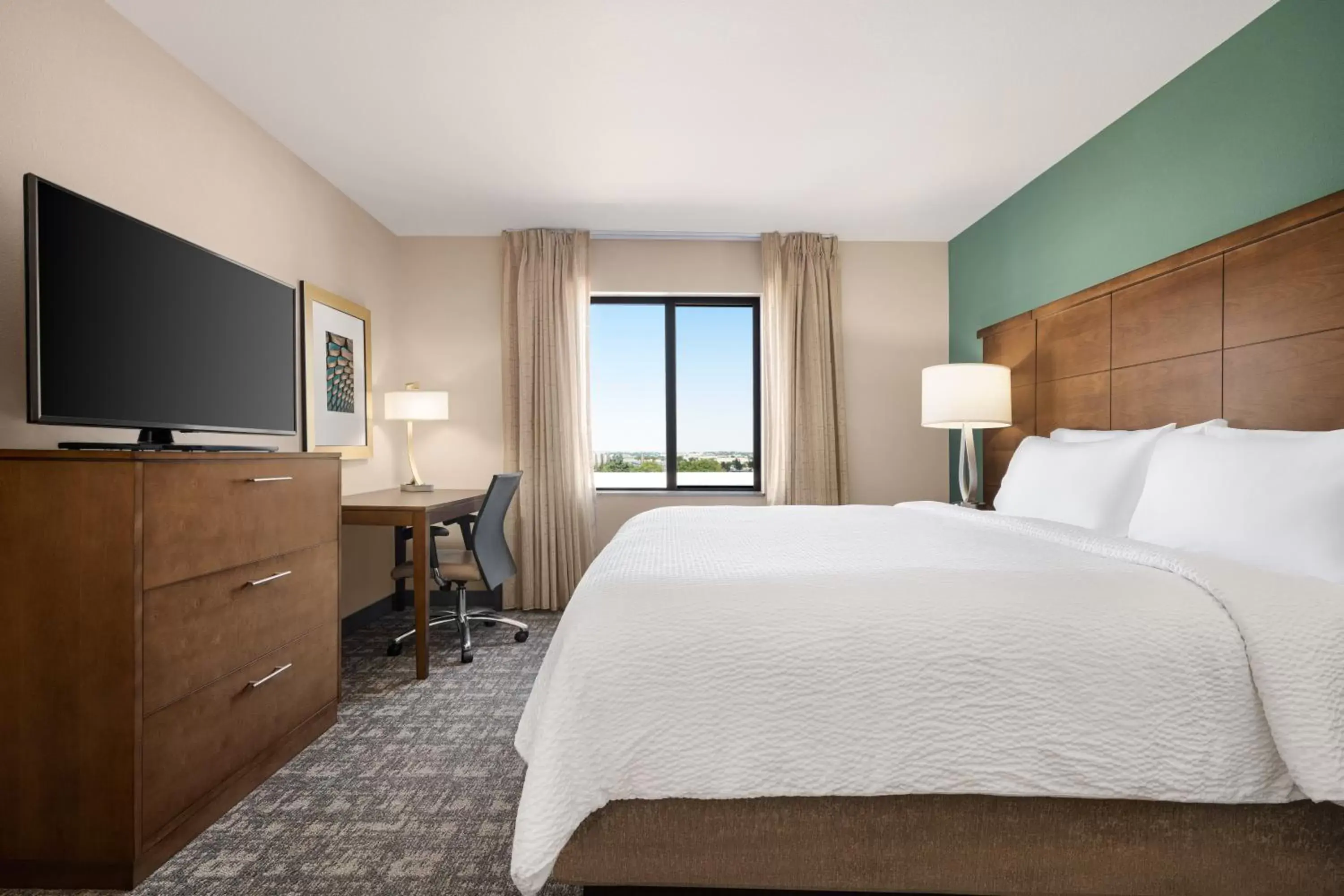 Bedroom in Staybridge Suites Oklahoma City-Quail Springs, an IHG Hotel