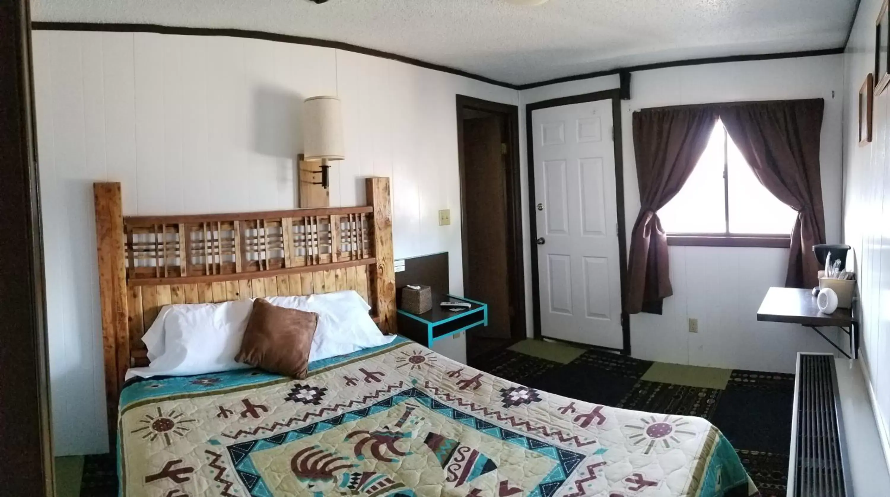 Bed in Adobe Sands Motel