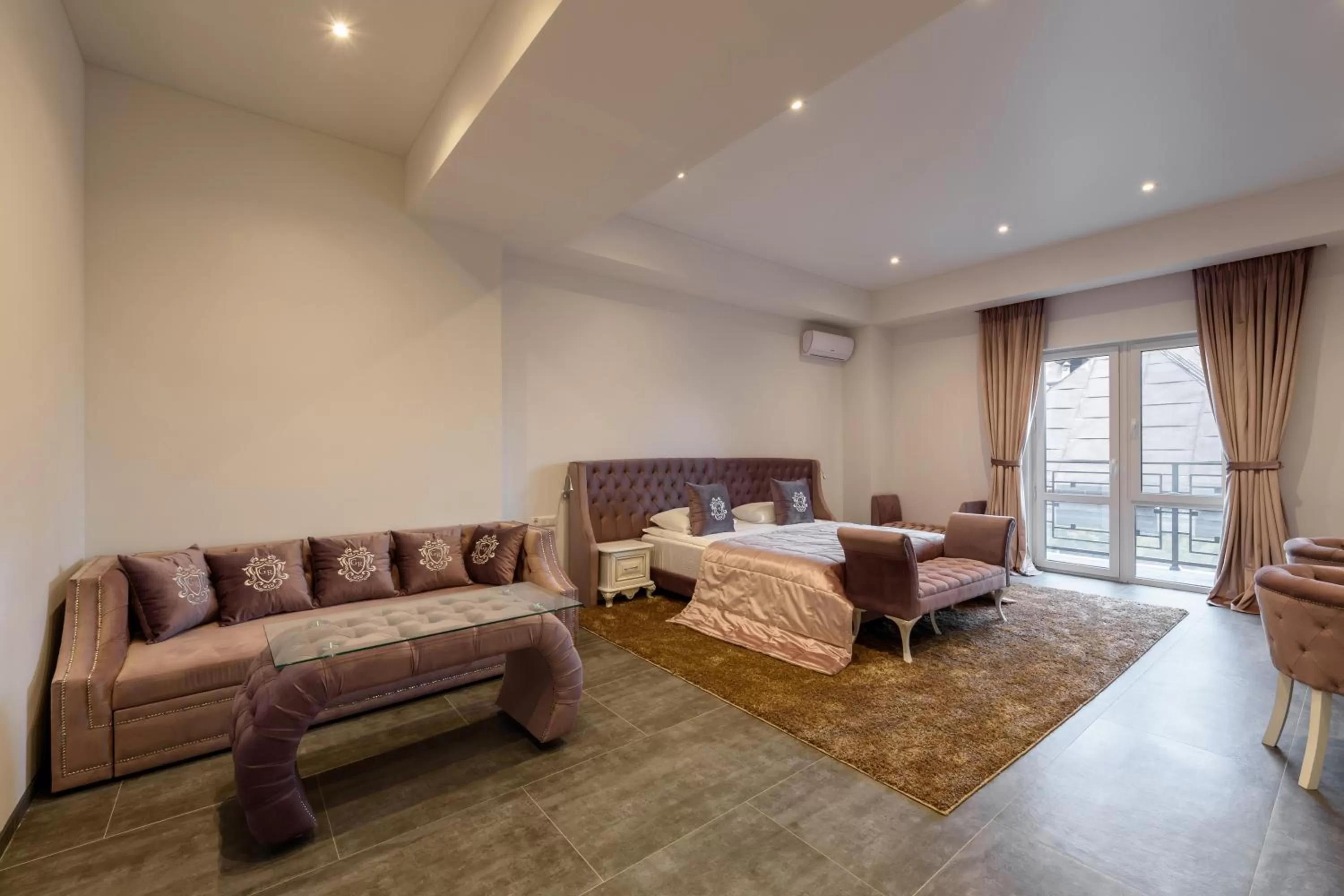 Bed, Seating Area in Grand Royal